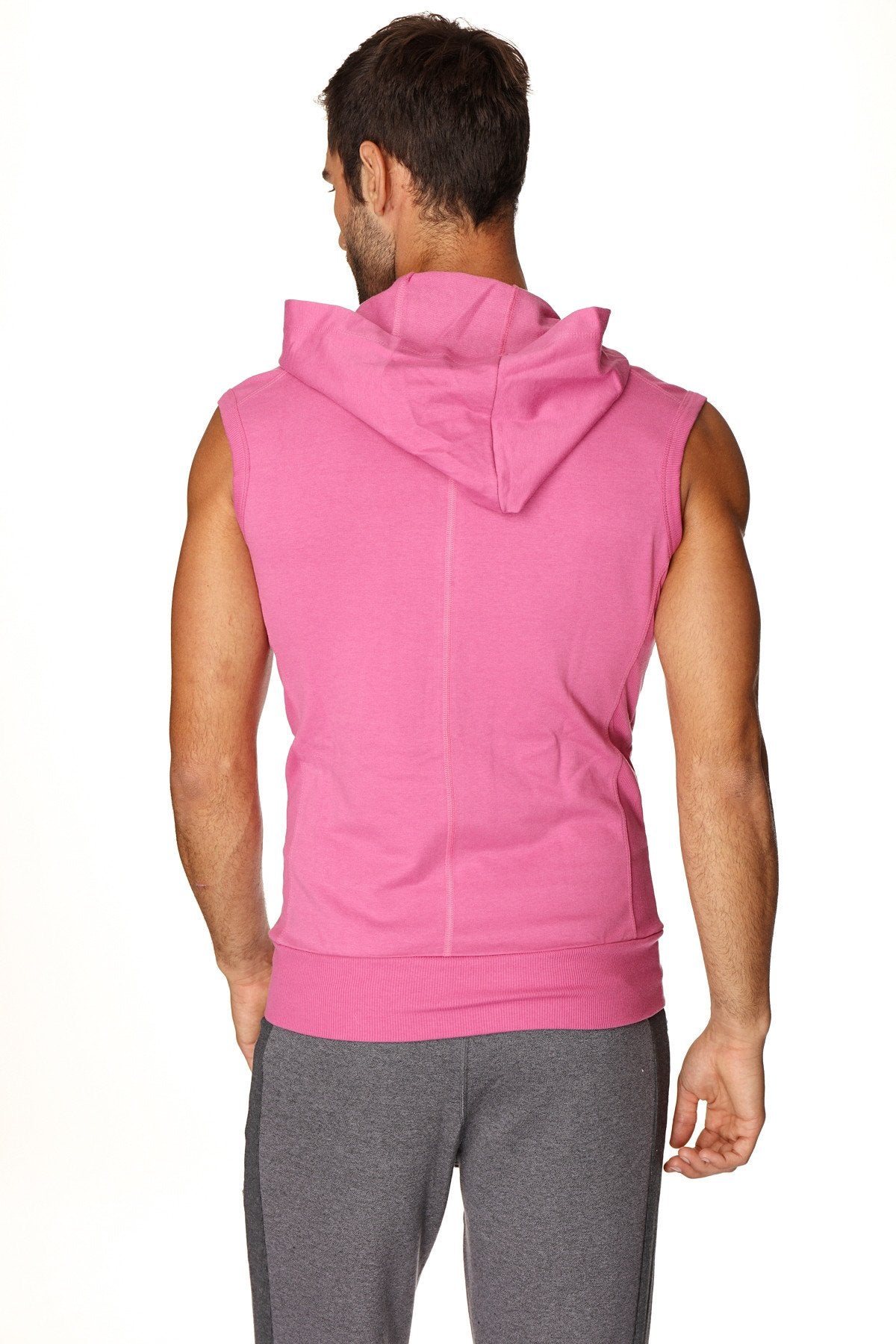 A vibrant berry sleeveless yoga hoodie with hood and ribbed cuffs made from soft fabric