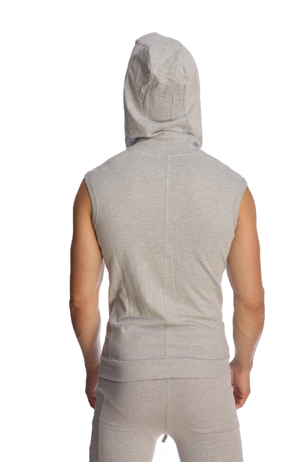 A light gray heather sleeveless yoga hoodie with hood and front seam worn by a person