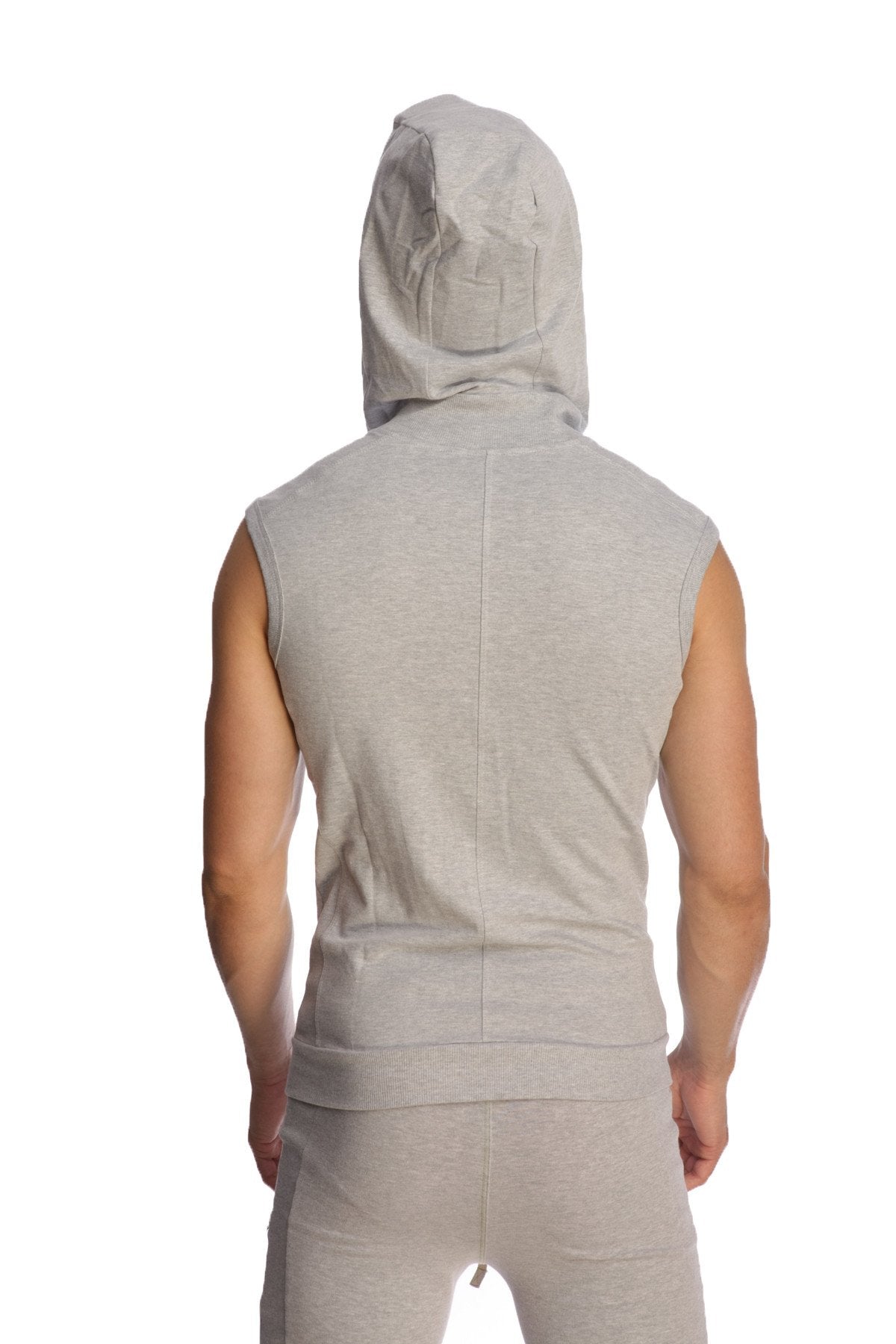 A light gray heather sleeveless yoga hoodie with hood and front seam worn by a person
