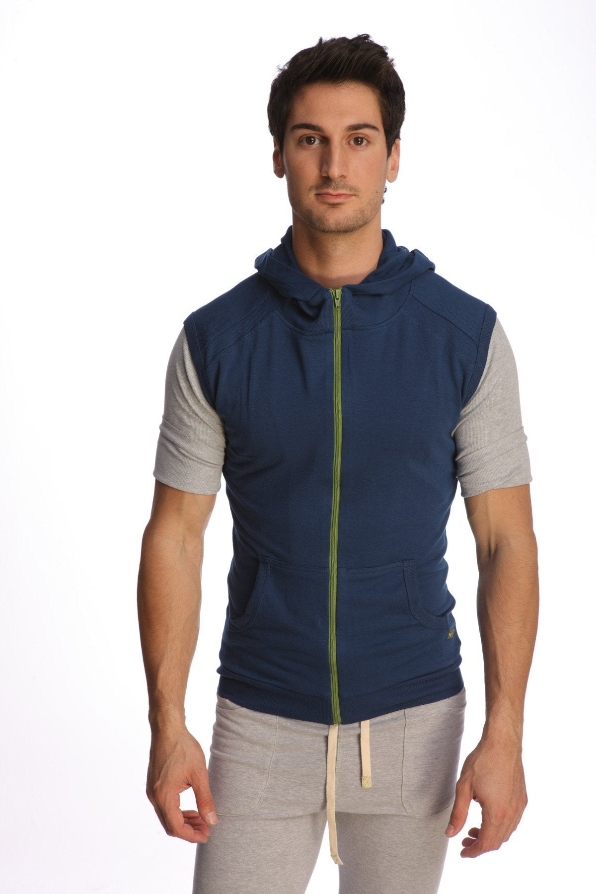 Sleeveless yoga hoodie vest in navy blue and gray with lime green zipper trim designed for comfortable workouts