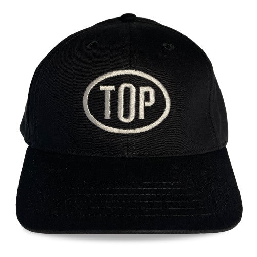 Black baseball cap with white embroidered top logo in oval from spunky monkee cap collection