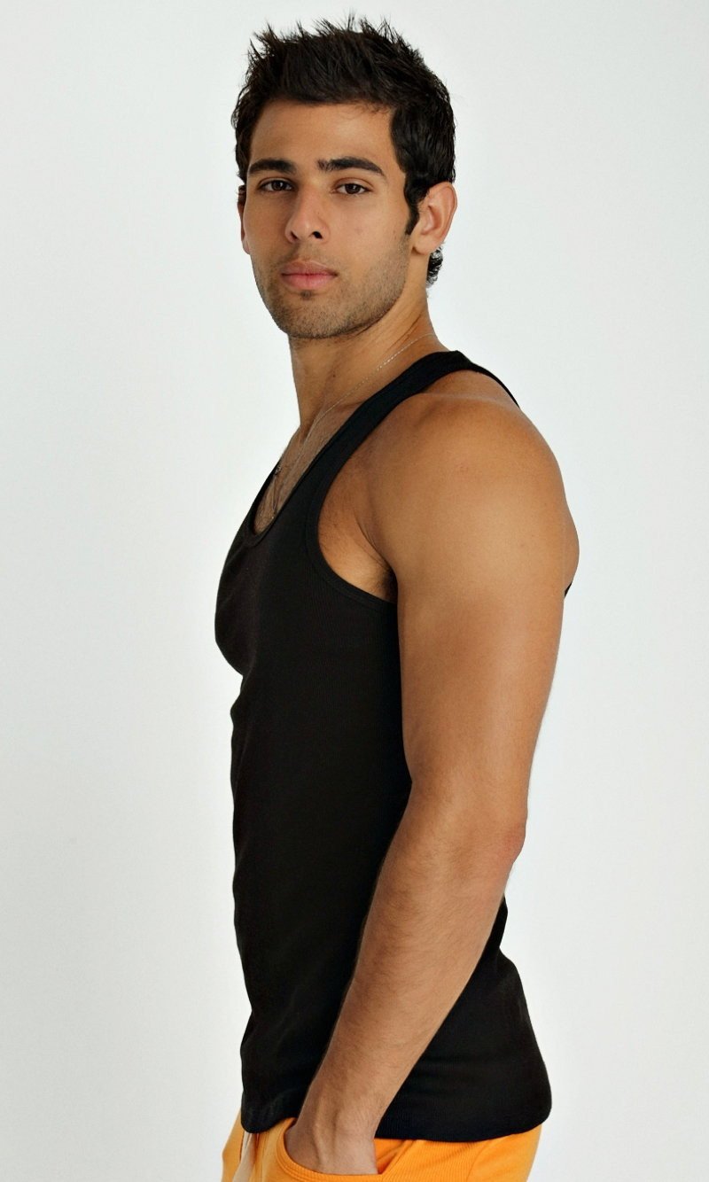 Black sleeveless sustain tank top with fitted form-fitting design made from sustainable material for activewear use