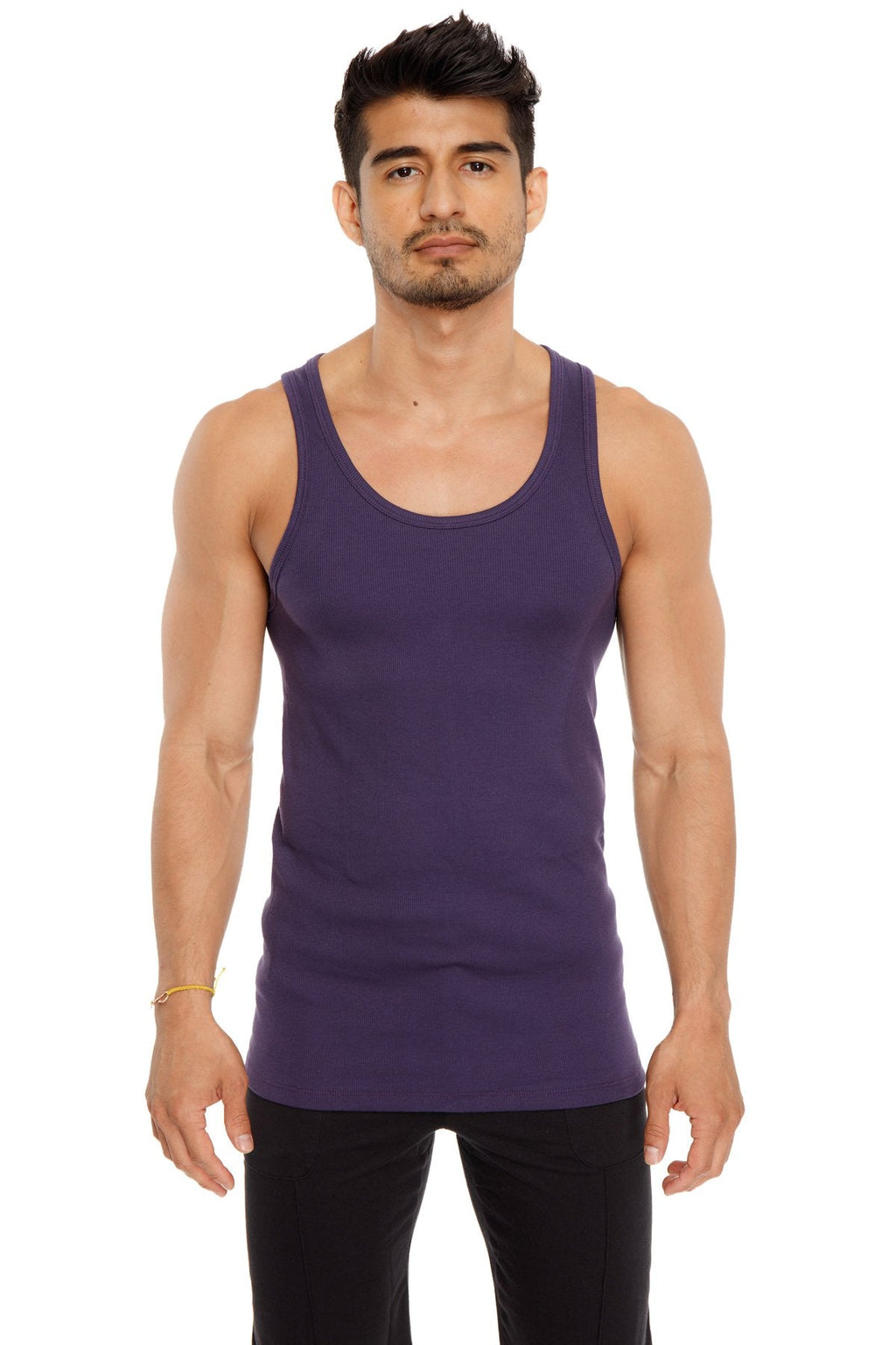 Purple sleeveless sustain tank top with rounded neckline and fitted silhouette in eggplant purple color