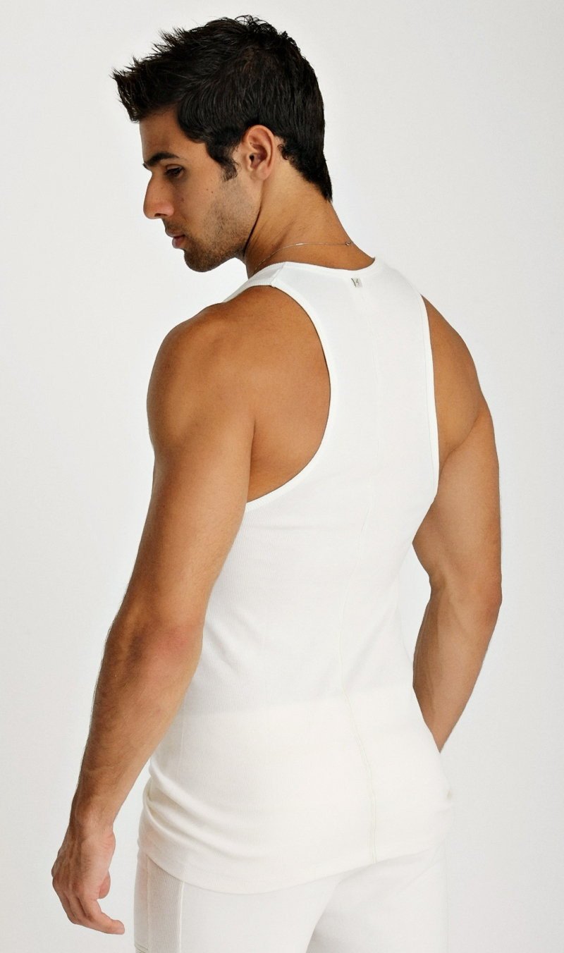 White sleeveless sustain tank top with a simple fitted design perfect for athletic wear