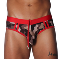 Camo print swim brief with red waistband, trim, and central drawstring featuring metallic aglets.