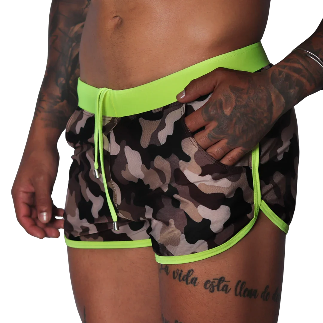 Short, camouflage-print athletic beach shorts with neon yellow waistband, drawstring, and trim accents.