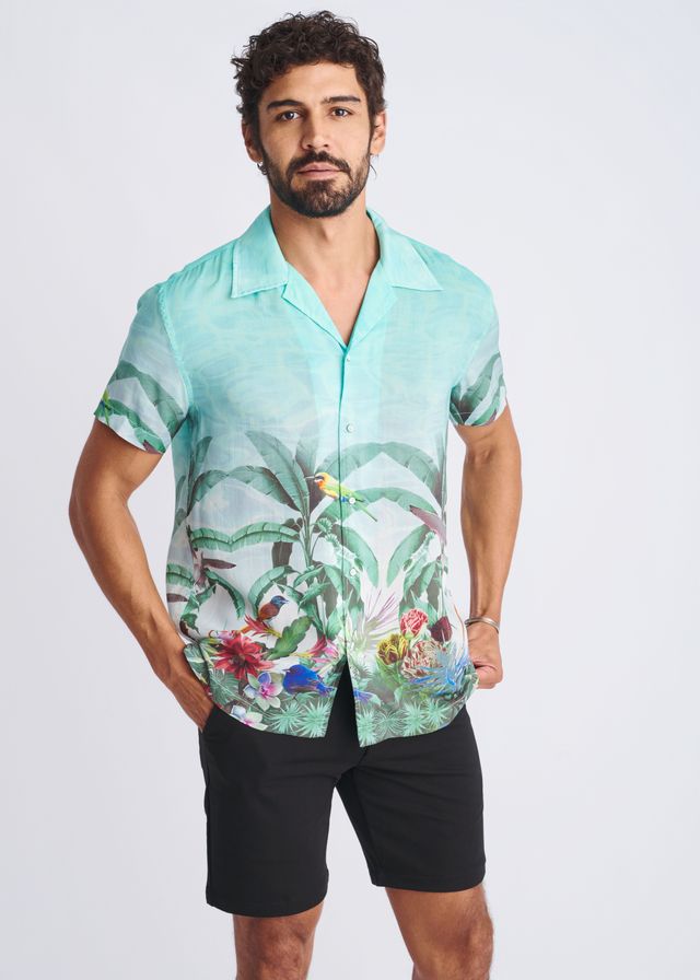 A men’s turquoise short-sleeved modal shirt with tropical leaf and bird print tropics border print s s modal shirt