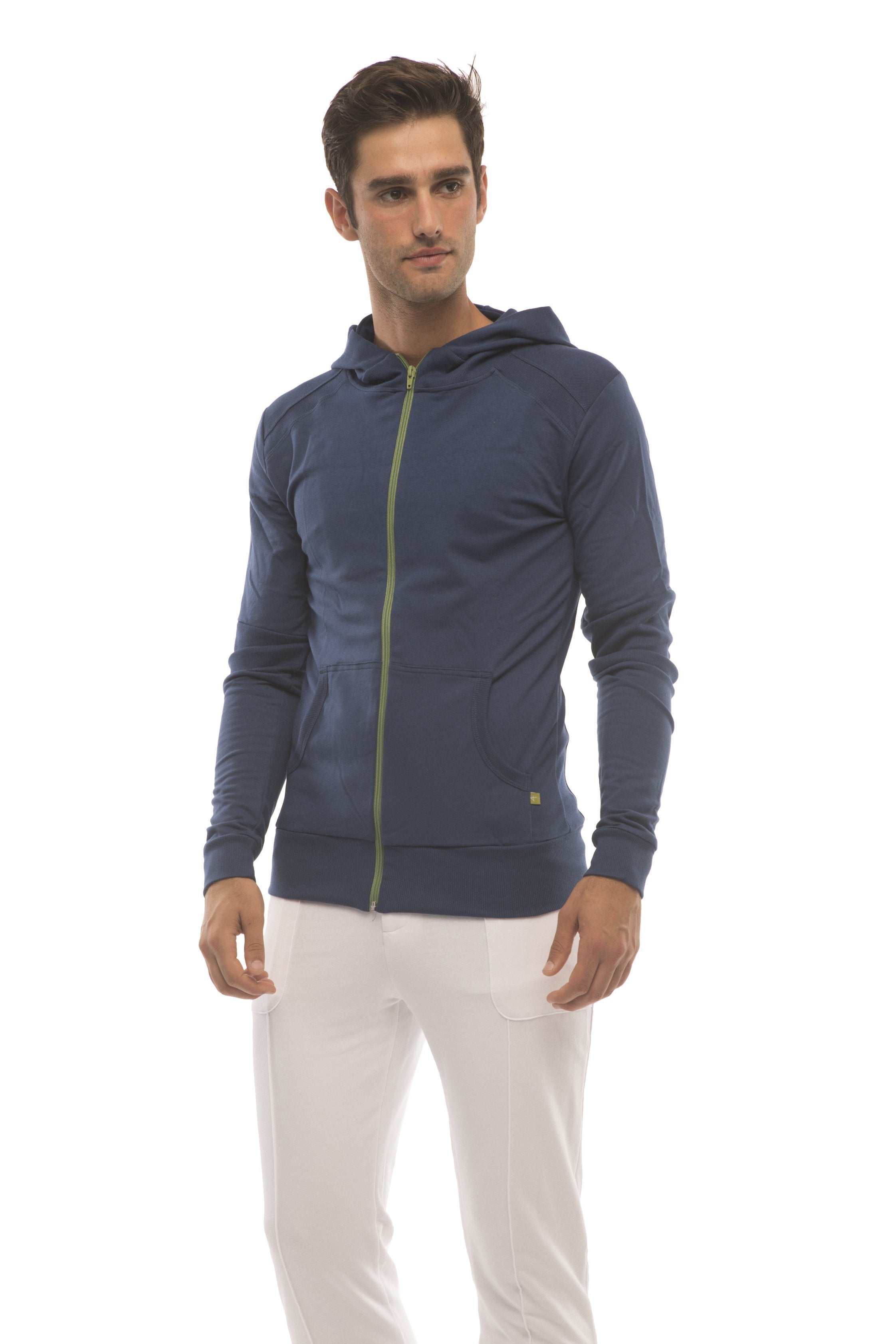 Navy blue zip-up hoodie with lime green zipper and branded sleeve detail paired with white tactical urban dress yoga pant