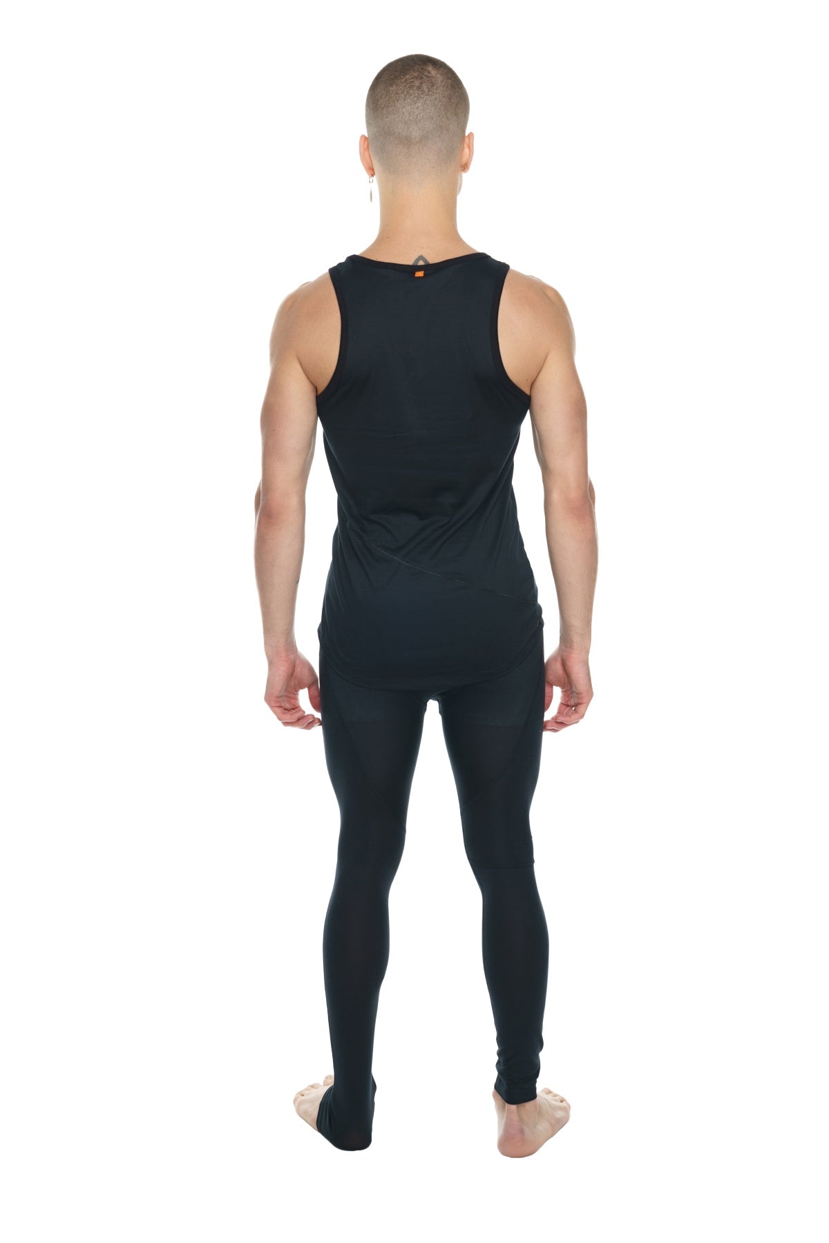 The perfect tank black carbon is a fitted black sleeveless athletic top with a small orange accent at the neckline