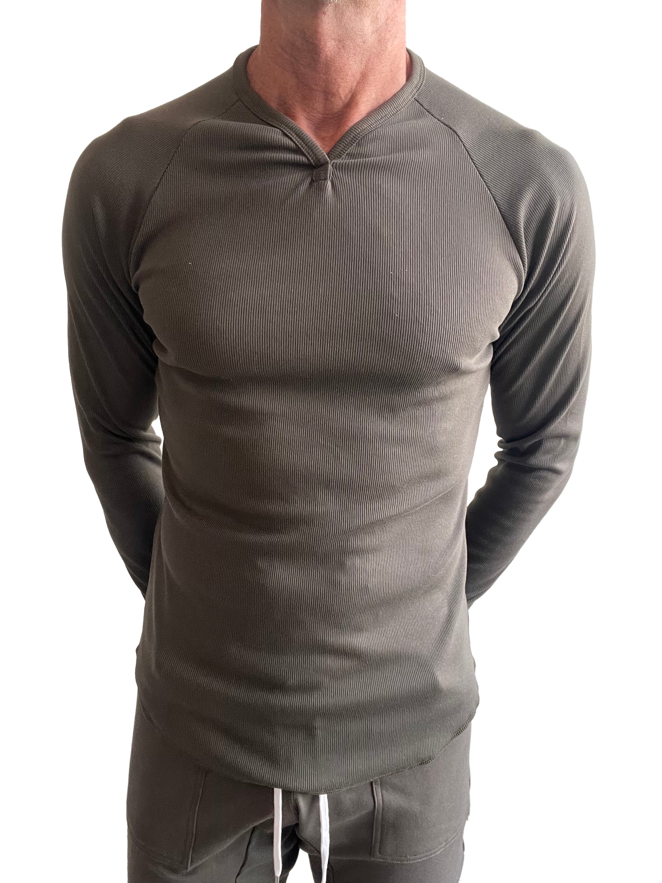 A sleek olive green thermal v neck long sleeve shirt with ribbed fabric and fitted design for layering or casual wear