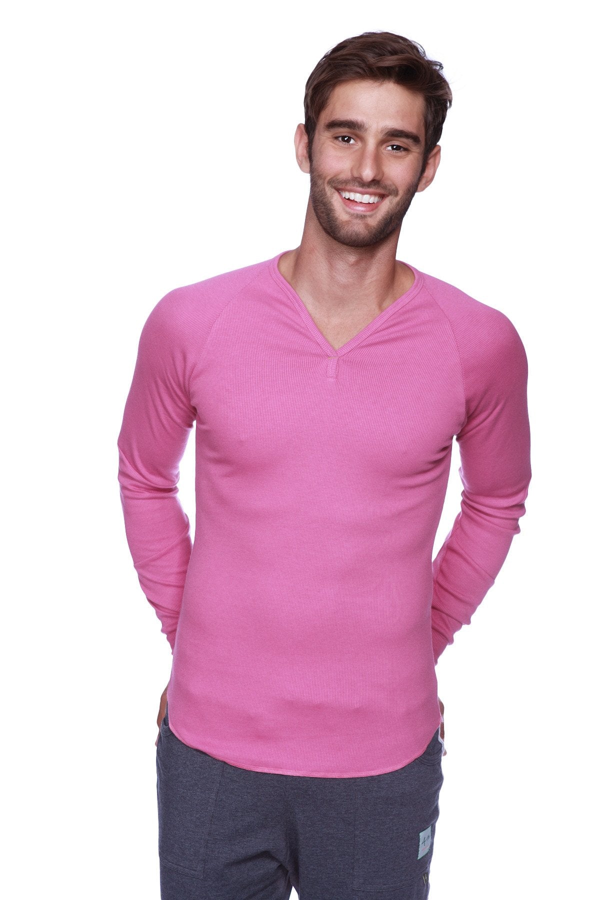 A vibrant berry thermal v-neck long sleeve shirt with ribbed texture and subtle seam detailing