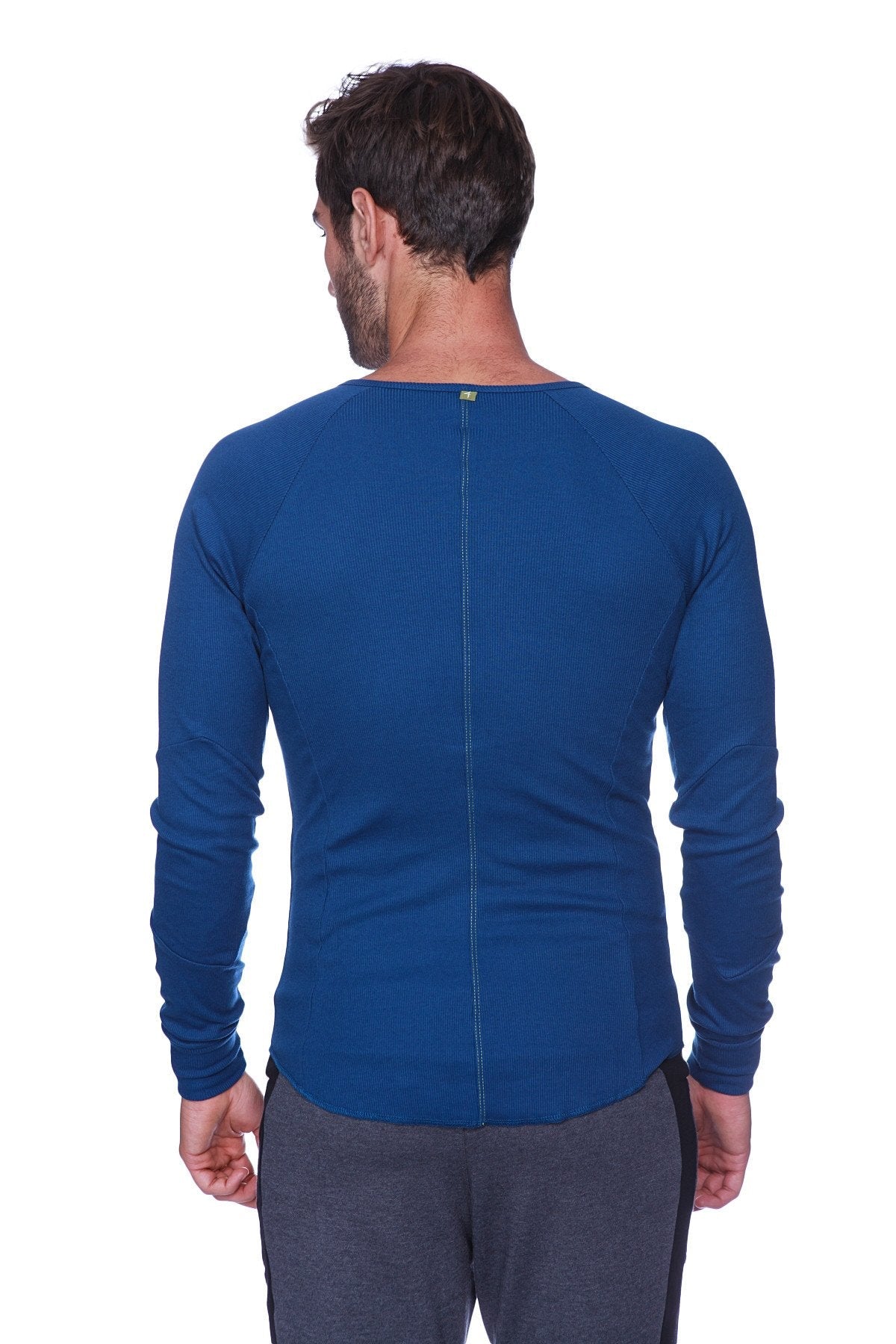 Thermal v-neck long sleeve royal blue athletic shirt with ribbed neckline and back zipper visible from the back side
