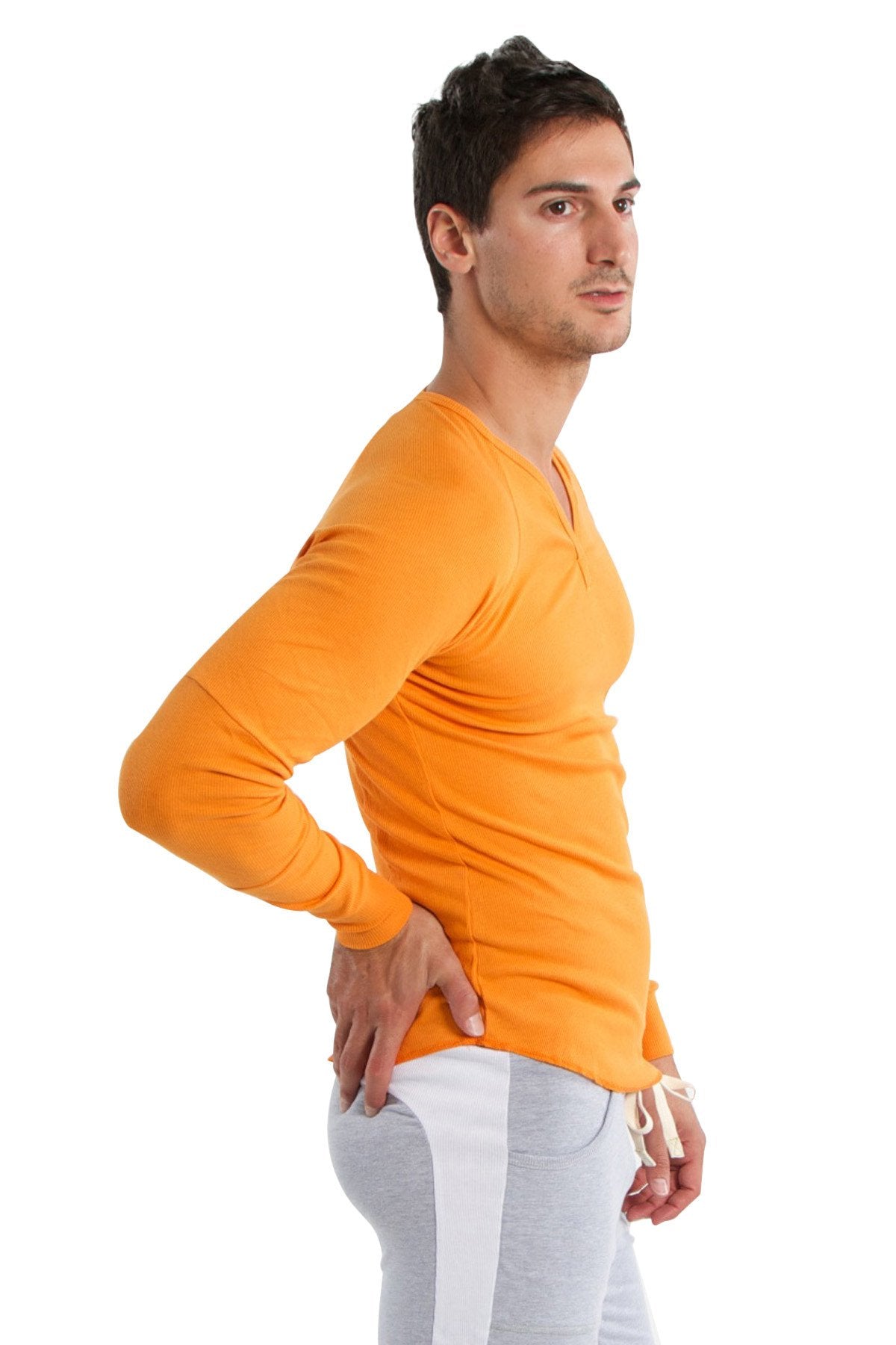 Vibrant sun orange thermal v-neck long sleeve shirt with snug fit and subtle ribbed texture