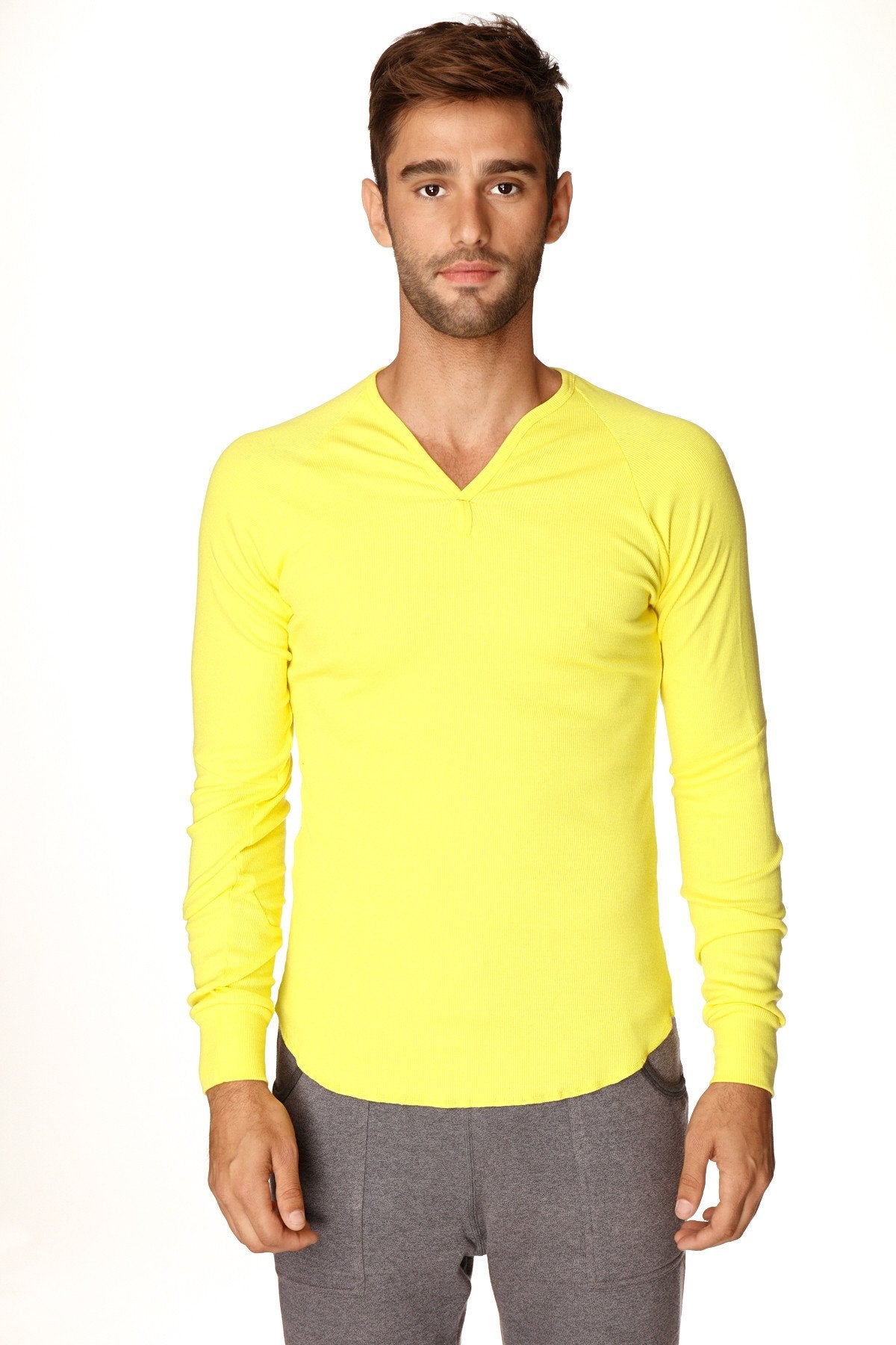 Bright yellow thermal v-neck long sleeve shirt made of warm material ideal for cold weather layering