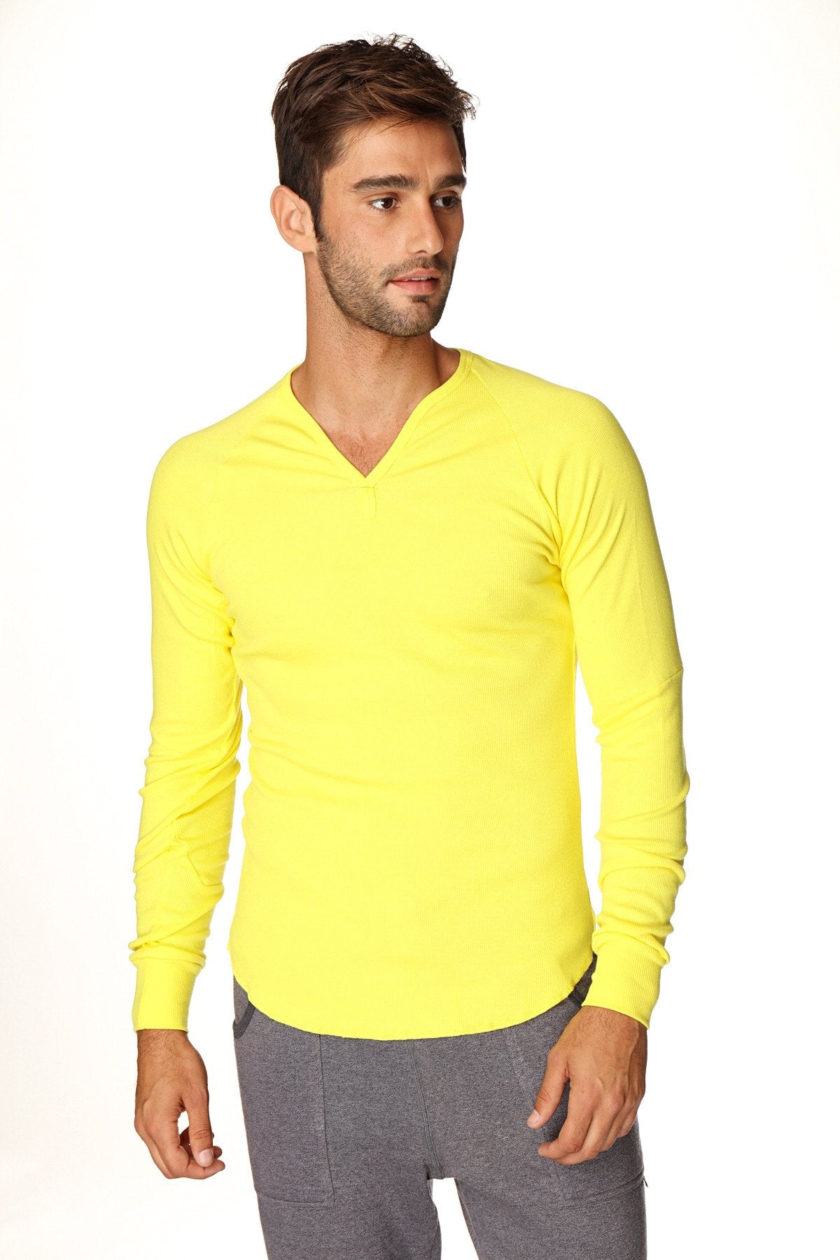 Bright yellow thermal v-neck long sleeve shirt featuring a warm and comfortable design in tropic yellow color