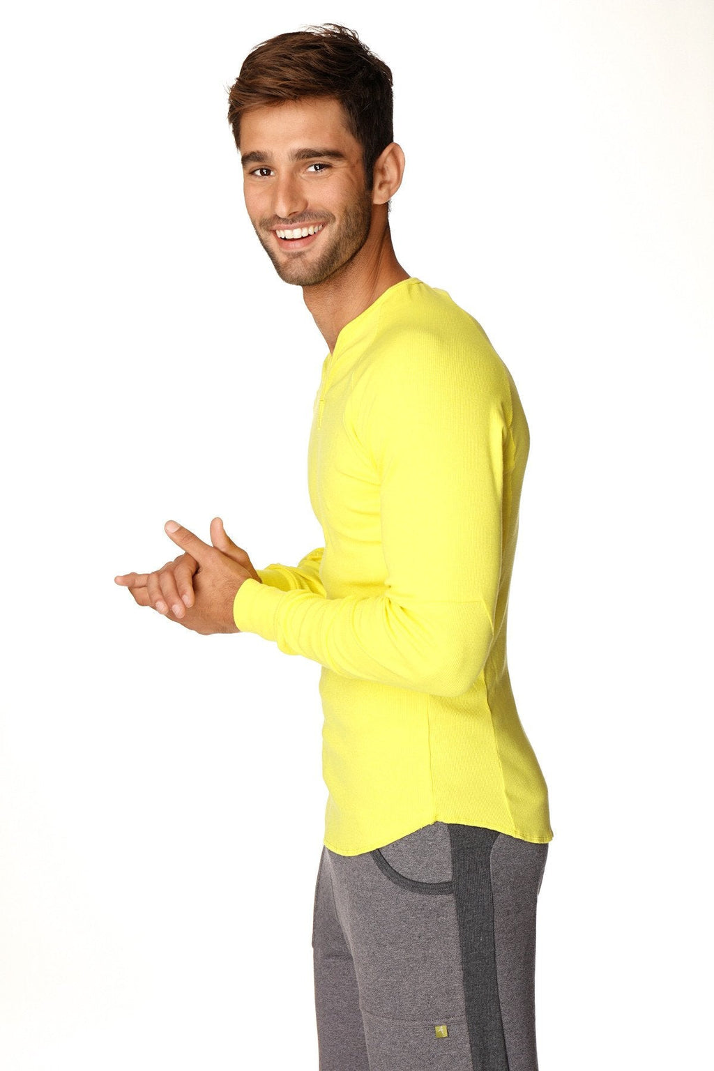 Bright yellow thermal long sleeve crew neck top designed for warmth and comfort in tropic yellow color
