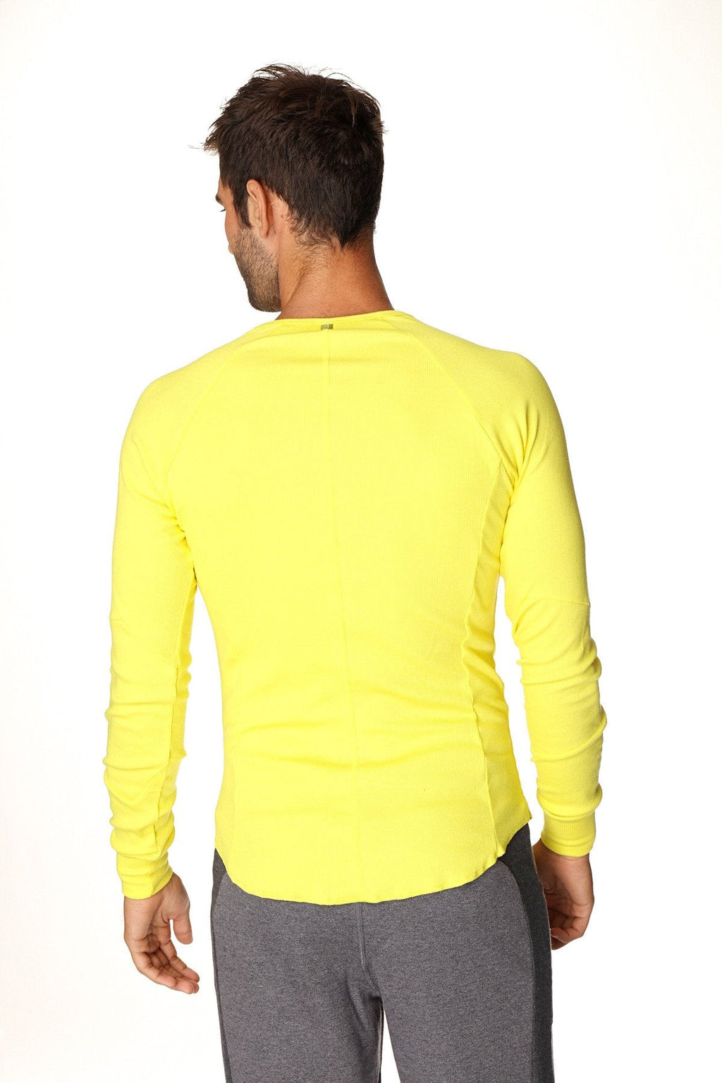 Thermal v-neck long sleeve athletic shirt in tropic yellow with fitted cut and ribbed cuffs for warmth and comfort