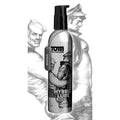 Silver metallic bottle of Tom of Finland hybrid lube with black pump and chain-link tag for smooth application