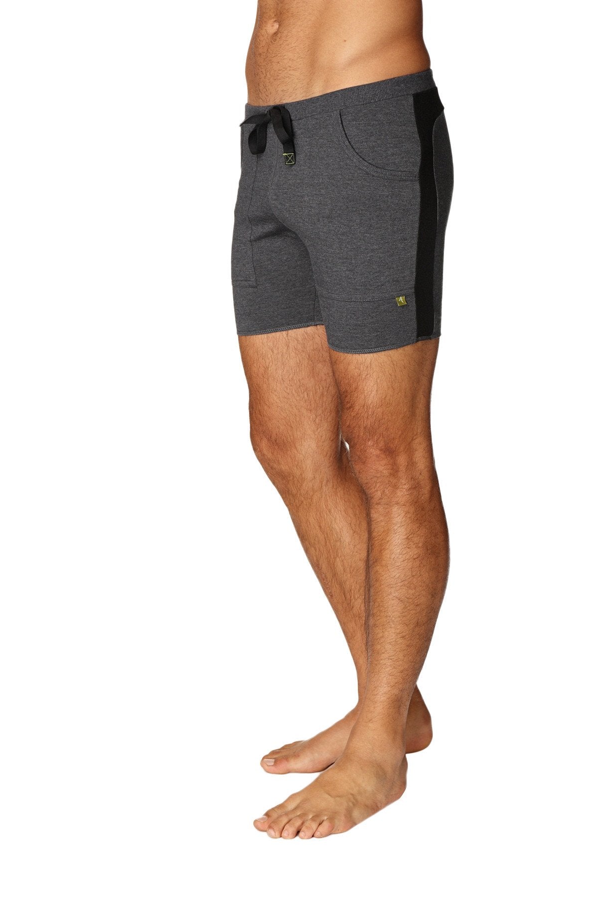 Transition yoga short in charcoal heathered fabric with black side panels and a drawstring waistband for comfort