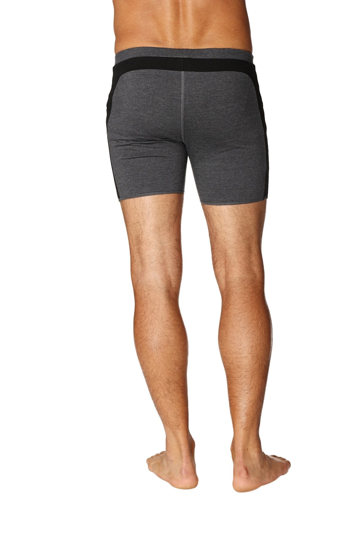 Transition yoga short charcoal with black features snug gray athletic shorts with black side panels and waistband for active wear