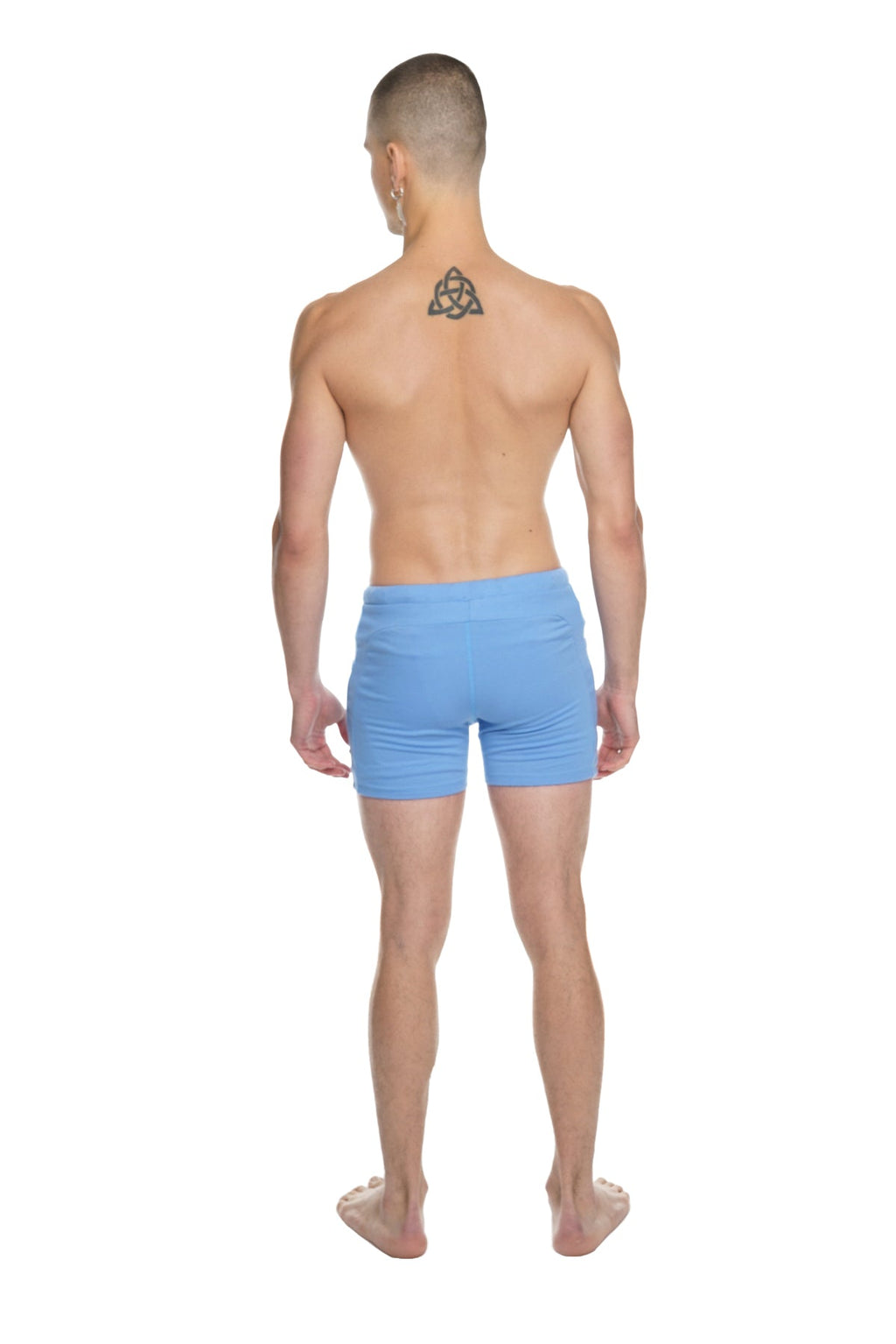Light blue form-fitting boxer briefs made from breathable fabric designed for transition yoga practice and comfort
