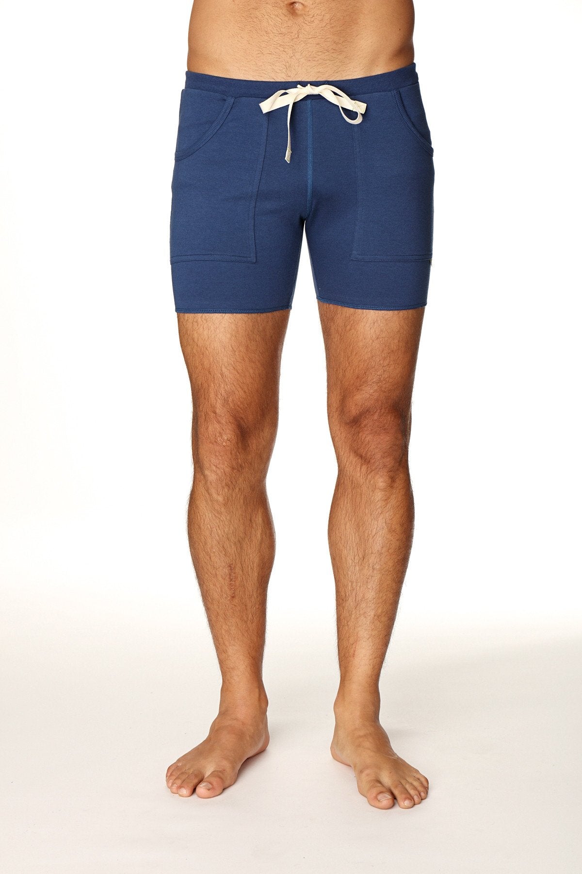Transition yoga short in navy blue with white drawstring and front pockets designed for athletic use