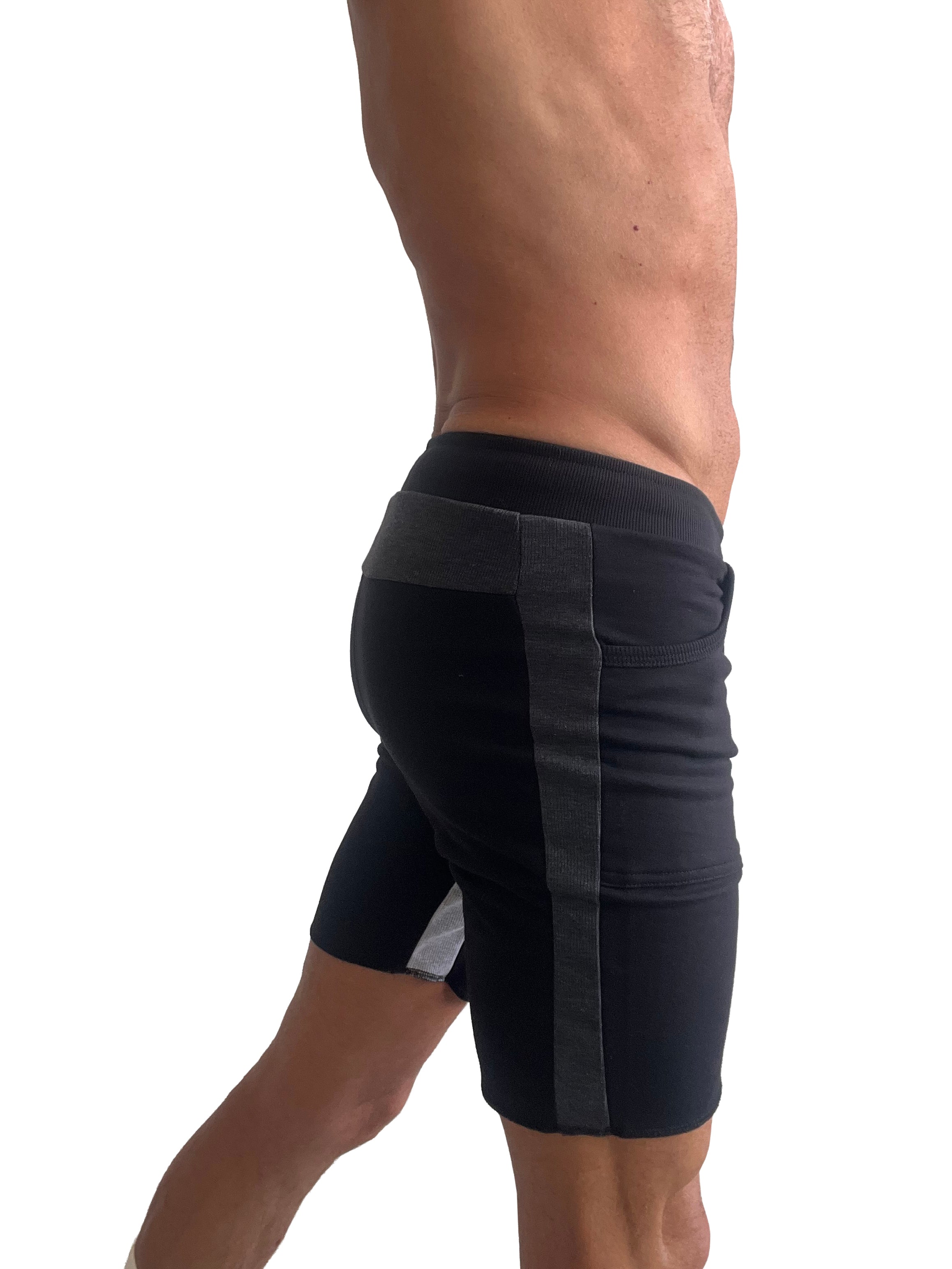 Black tri-color ultra-flex yoga track shorts with ribbed waistband and dark gray vertical side stripes for athletic use