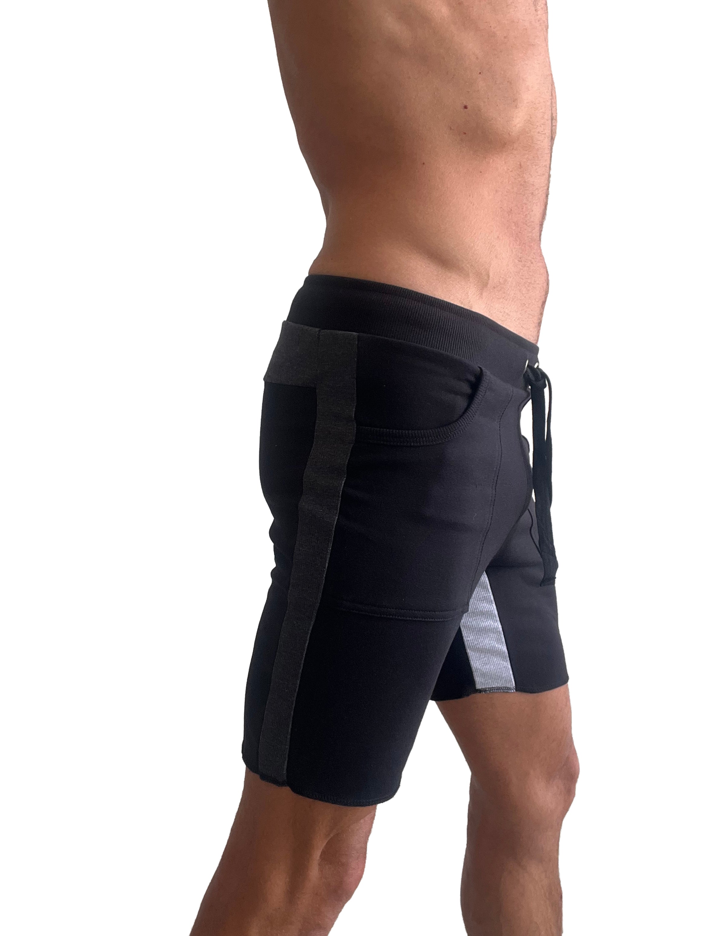 Black tri-color ultra-flex yoga track shorts with ribbed waistband side stripes and mesh thigh paneling