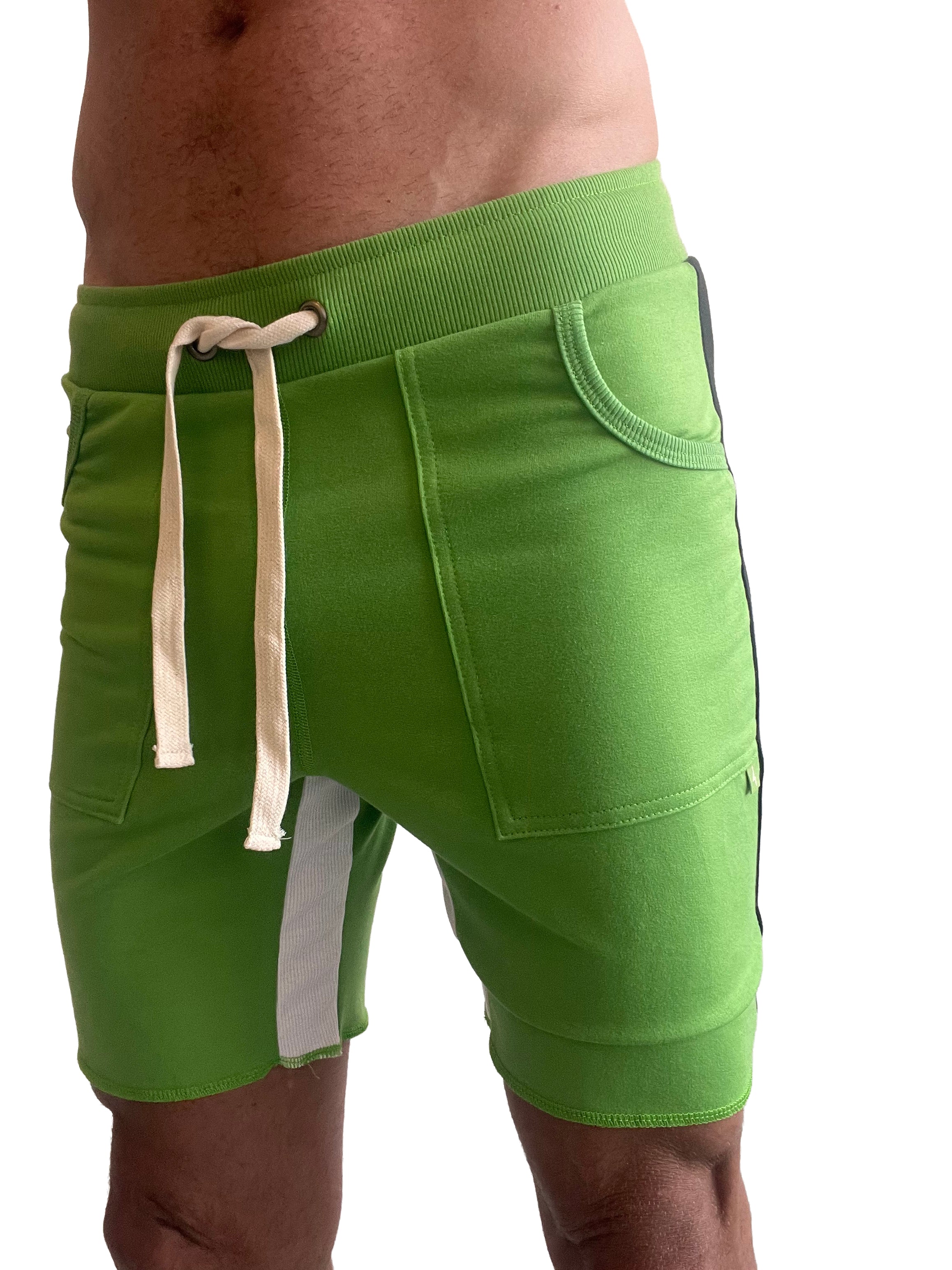Bright green tri-color ultra-flex yoga track shorts with ribbed waistband cream drawstrings and black side stripes
