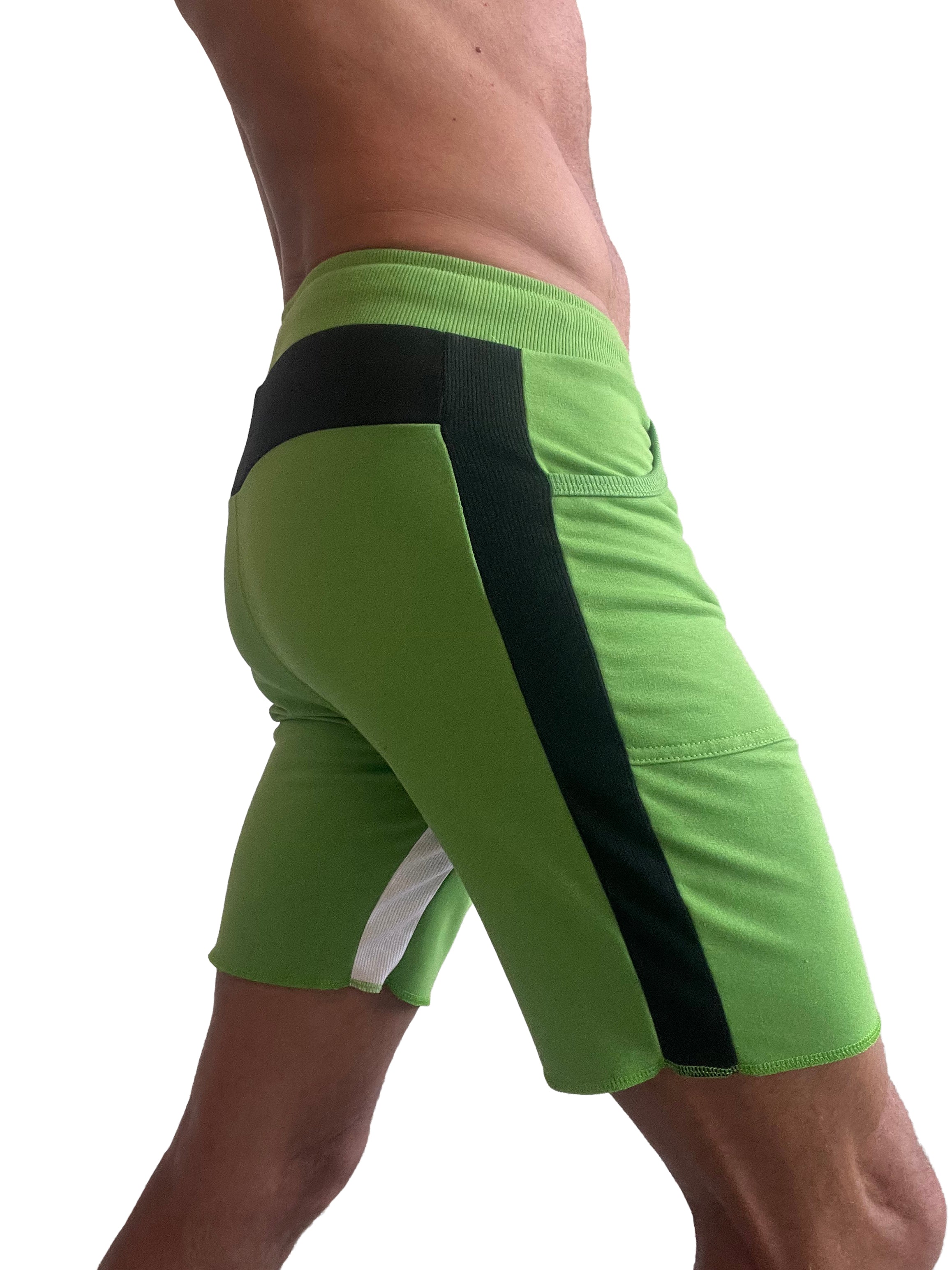 Vibrant lime green tri-color ultra-flex yoga track shorts with bold black and white side panels for active wear
