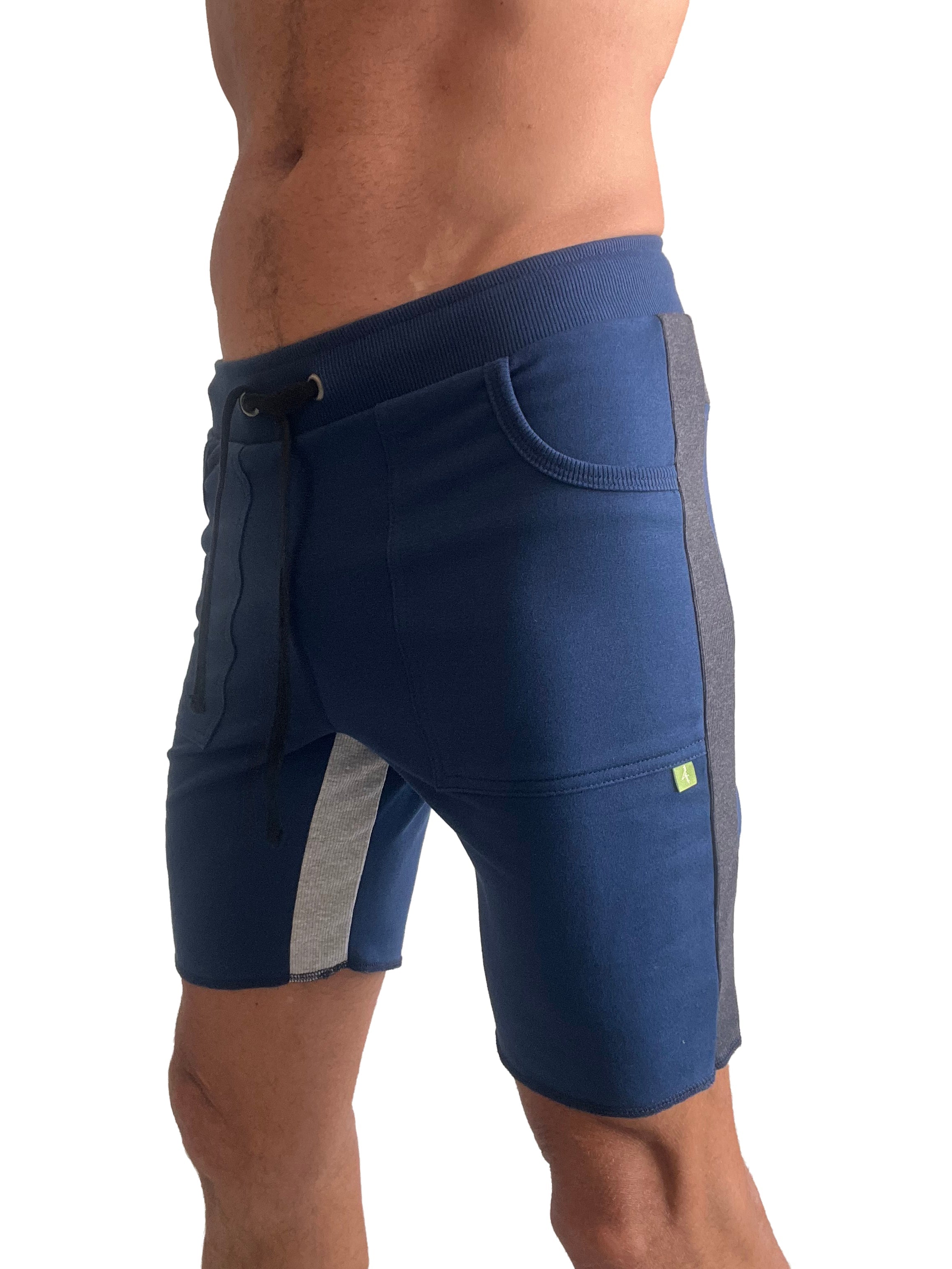 Navy blue tri-color ultra-flex yoga track shorts with gray side panels and green logo on the thigh for activewear