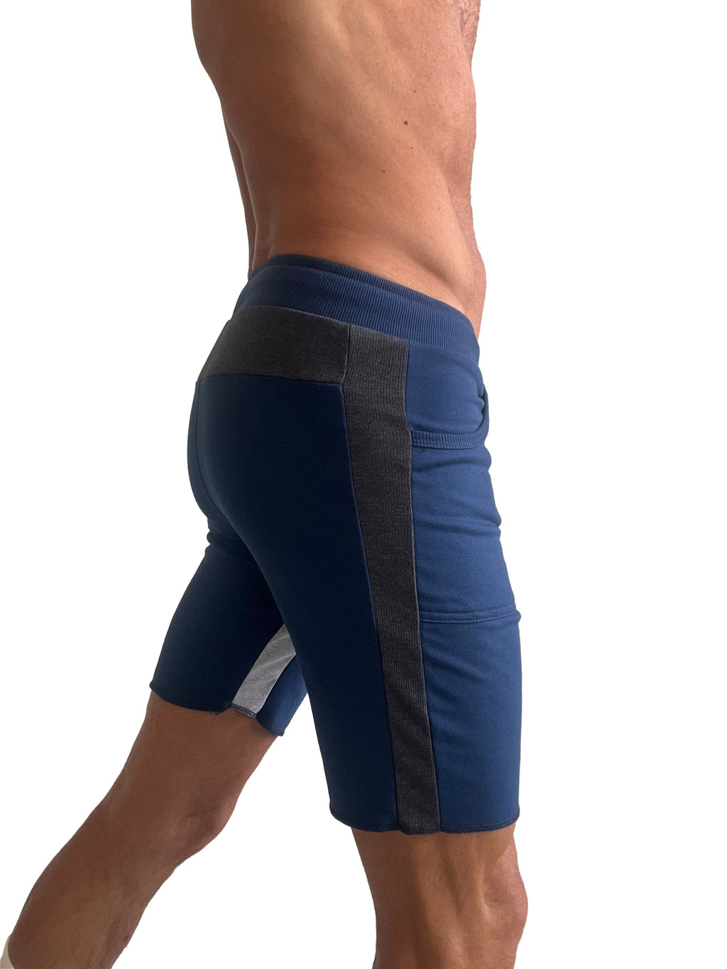 Navy blue tri-color ultra-flex yoga track shorts with dark gray vertical stripe and white hem accent for athletic use