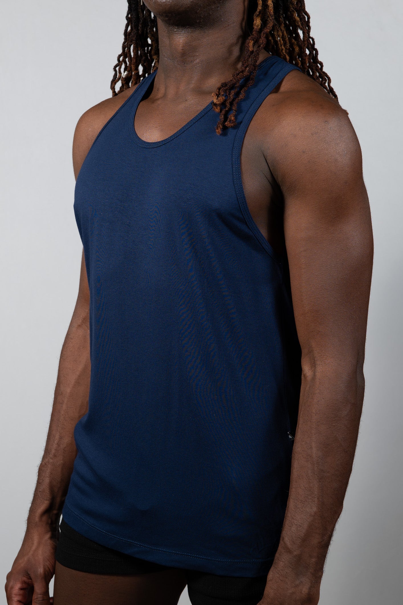 Navy blue sleeveless Tulio Solid Tank made of lightweight breathable fabric ideal for casual summer wear
