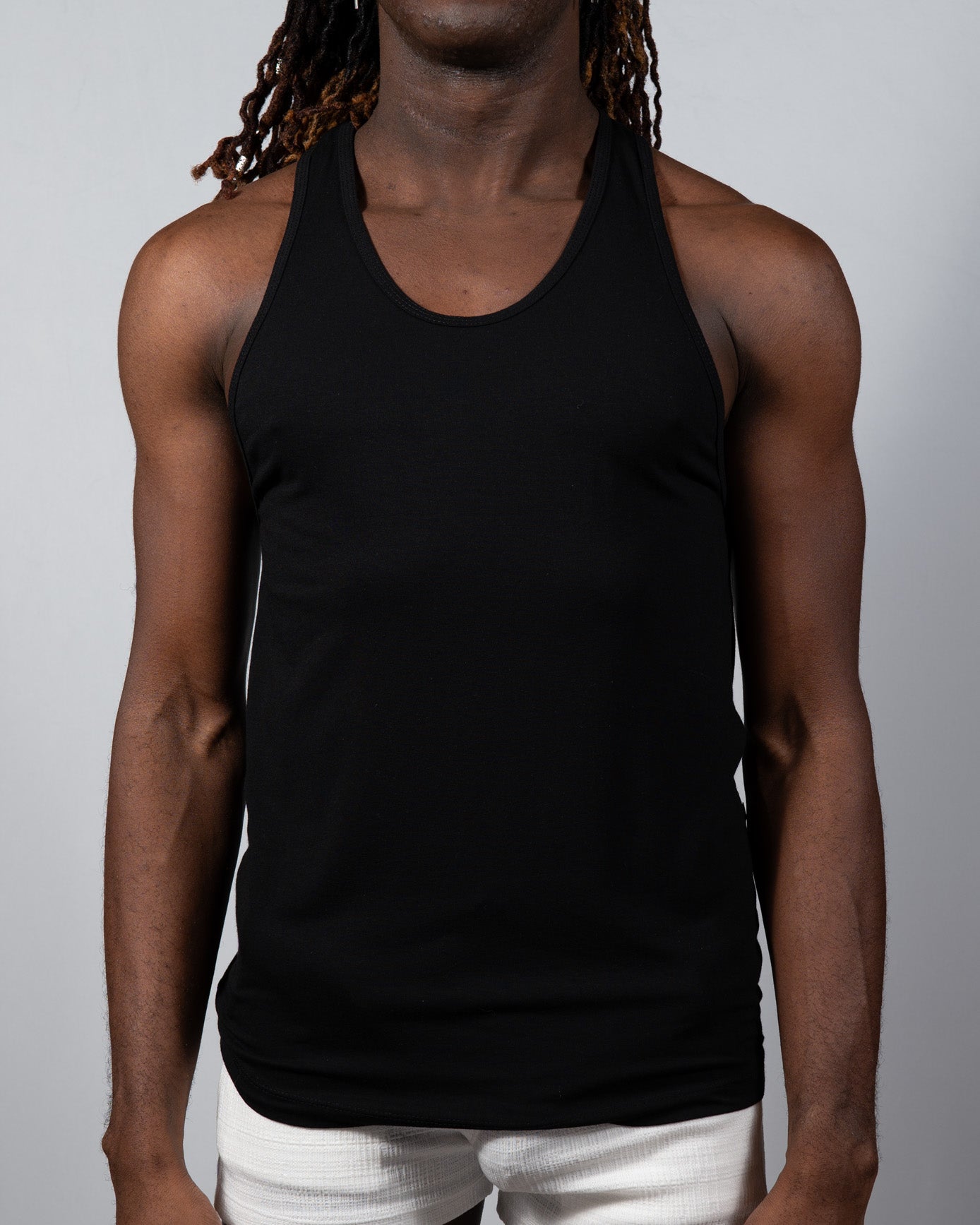 Black sleeveless tank top tulio solid tank with rounded neckline and fitted silhouette for casual wear
