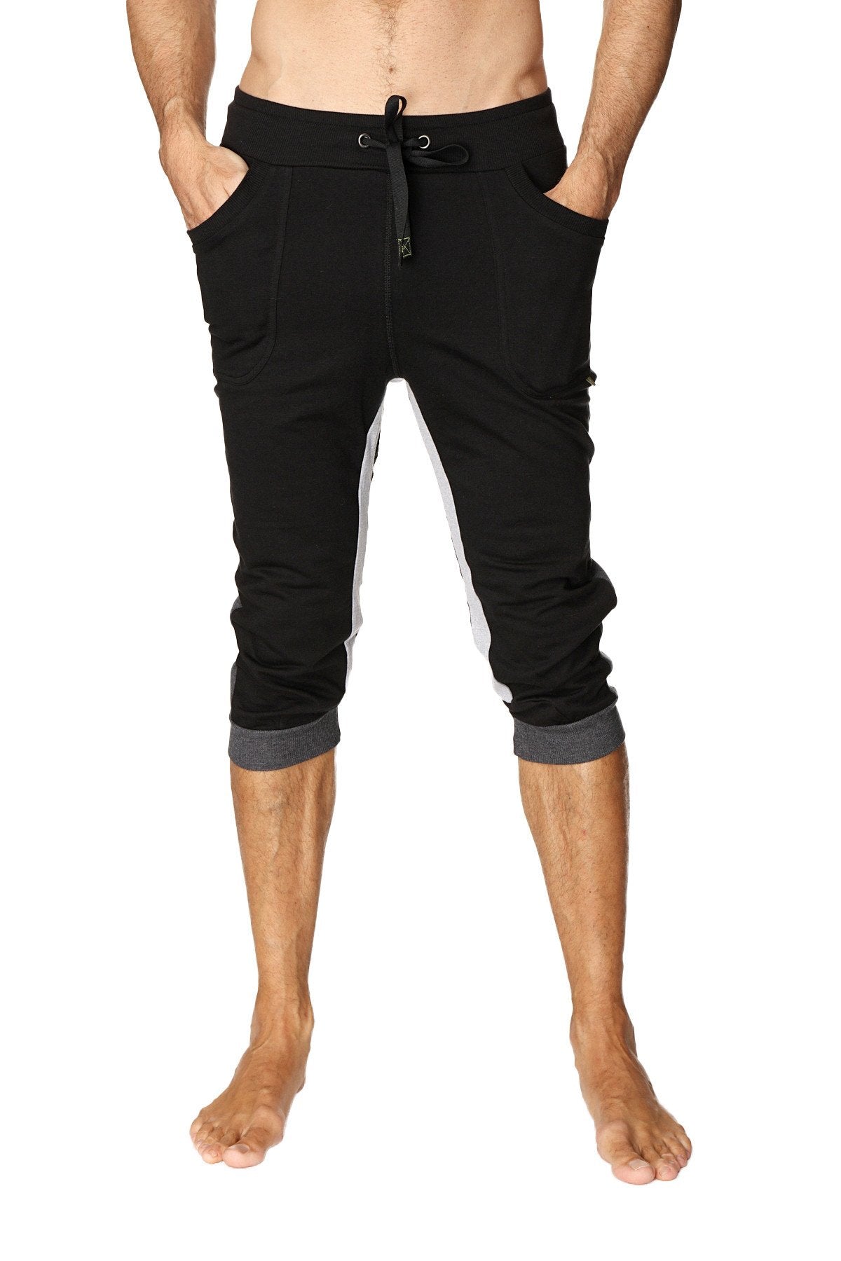 Black ultra-flex tri-color cuffed yoga pant with white side stripes and gray cuffs in capri-length jogger style
