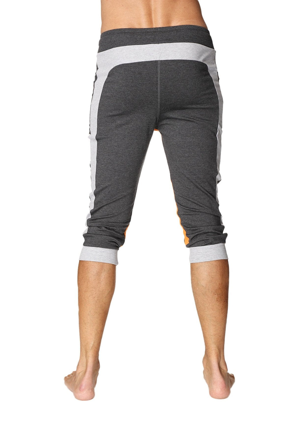 Dark gray capri-length leggings with light gray side panels and cuffs featuring a heathered texture for yoga