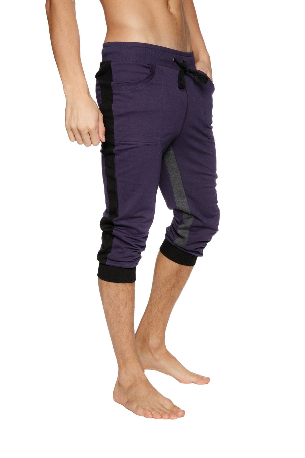 Ultra-flex tri-color cuffed yoga pant in eggplant with black side stripes and elastic cuffs for flexible athletic wear