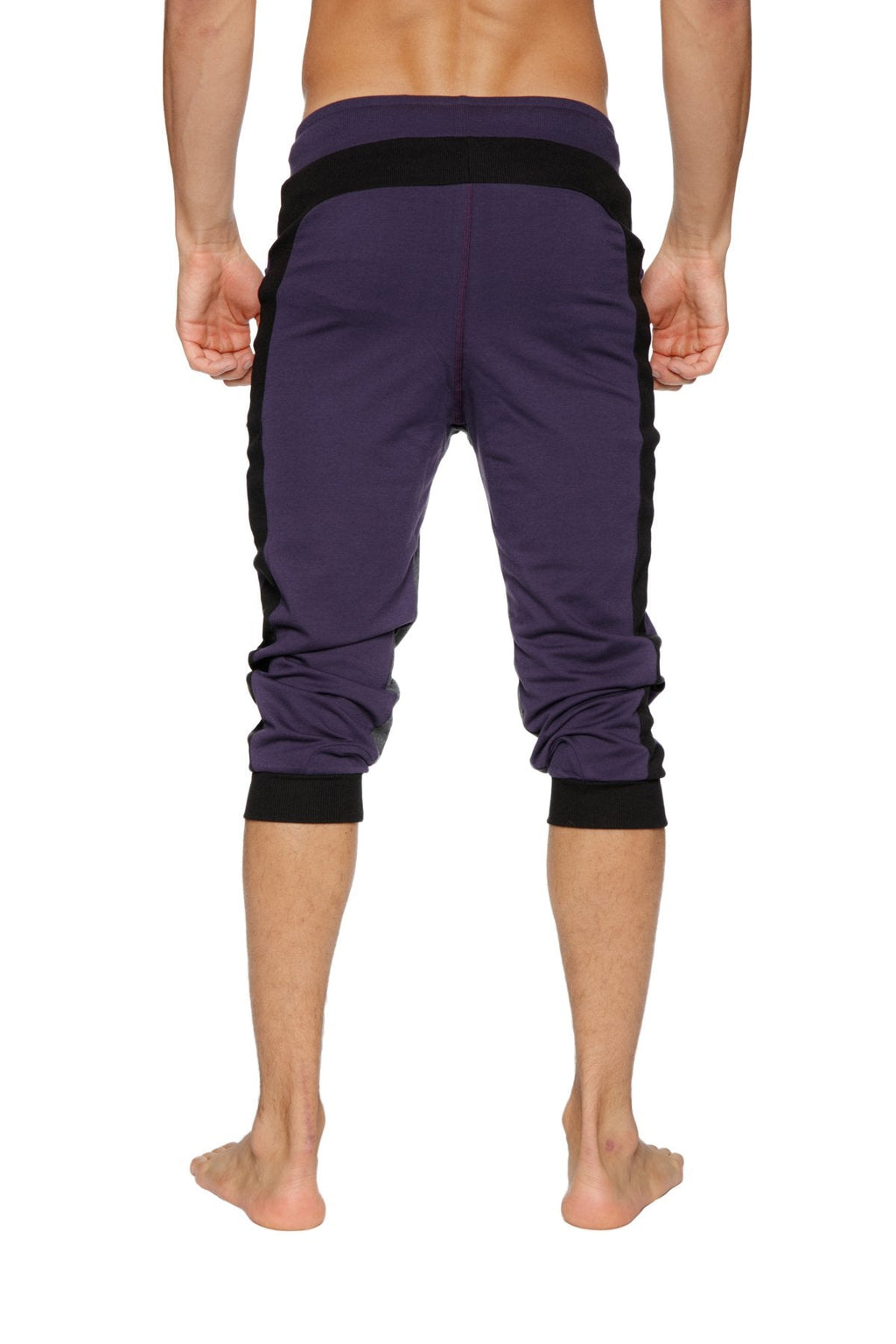 Ultra-flex tri-color cuffed yoga pant in eggplant with black side panels and elastic cuffs for athletic wear