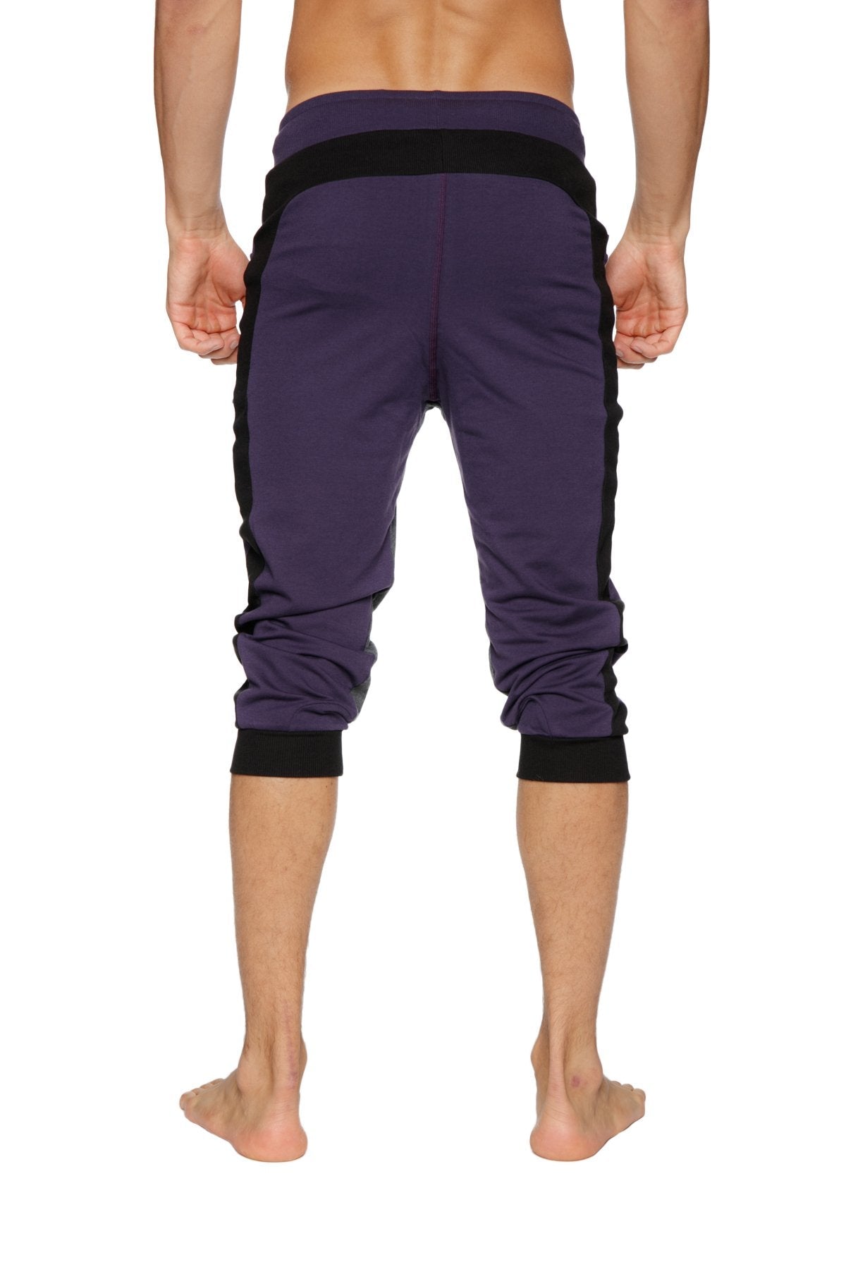 Ultra-flex tri-color cuffed yoga pant in eggplant with black side panels and elastic cuffs for athletic wear