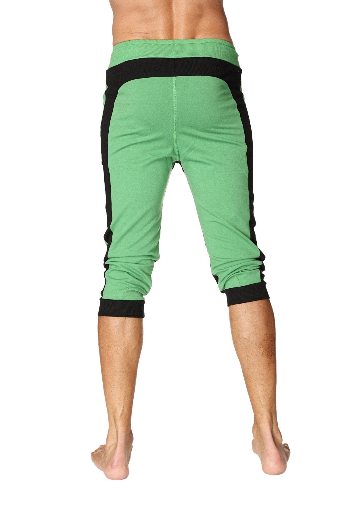 Green ultra-flex tri-color cuffed yoga pant with black side panels and elastic cuffs for flexible comfort