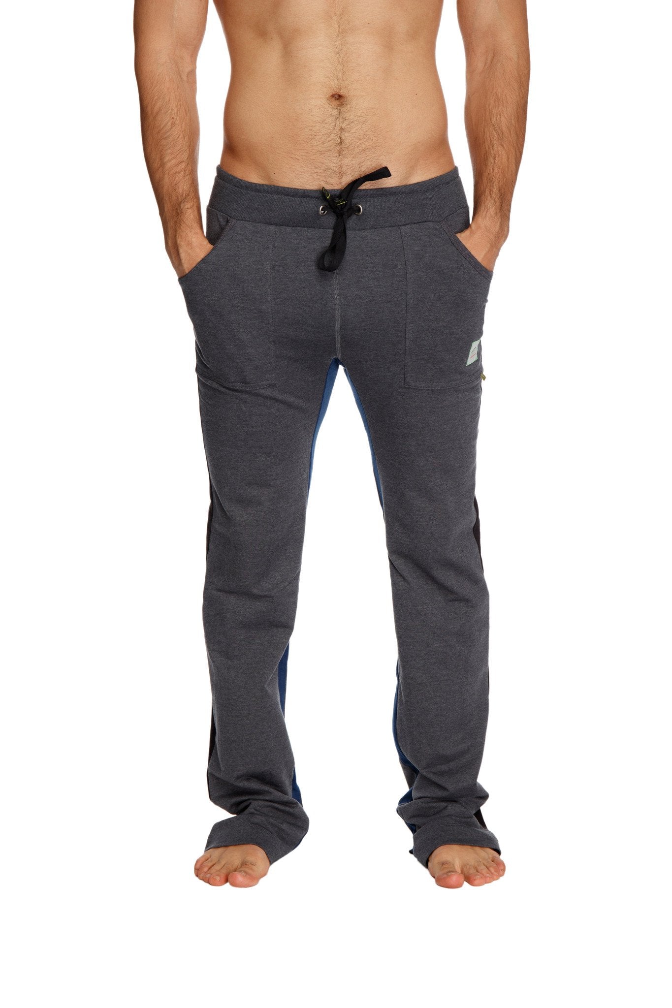 Ultra flex yoga track and yoga sweat pant in charcoal with black drawstring waistband and subtle royal blue side panels