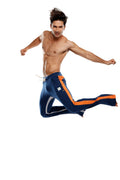 Navy blue ultra flex yoga sweat pants with orange and white side stripes designed for athletic use
