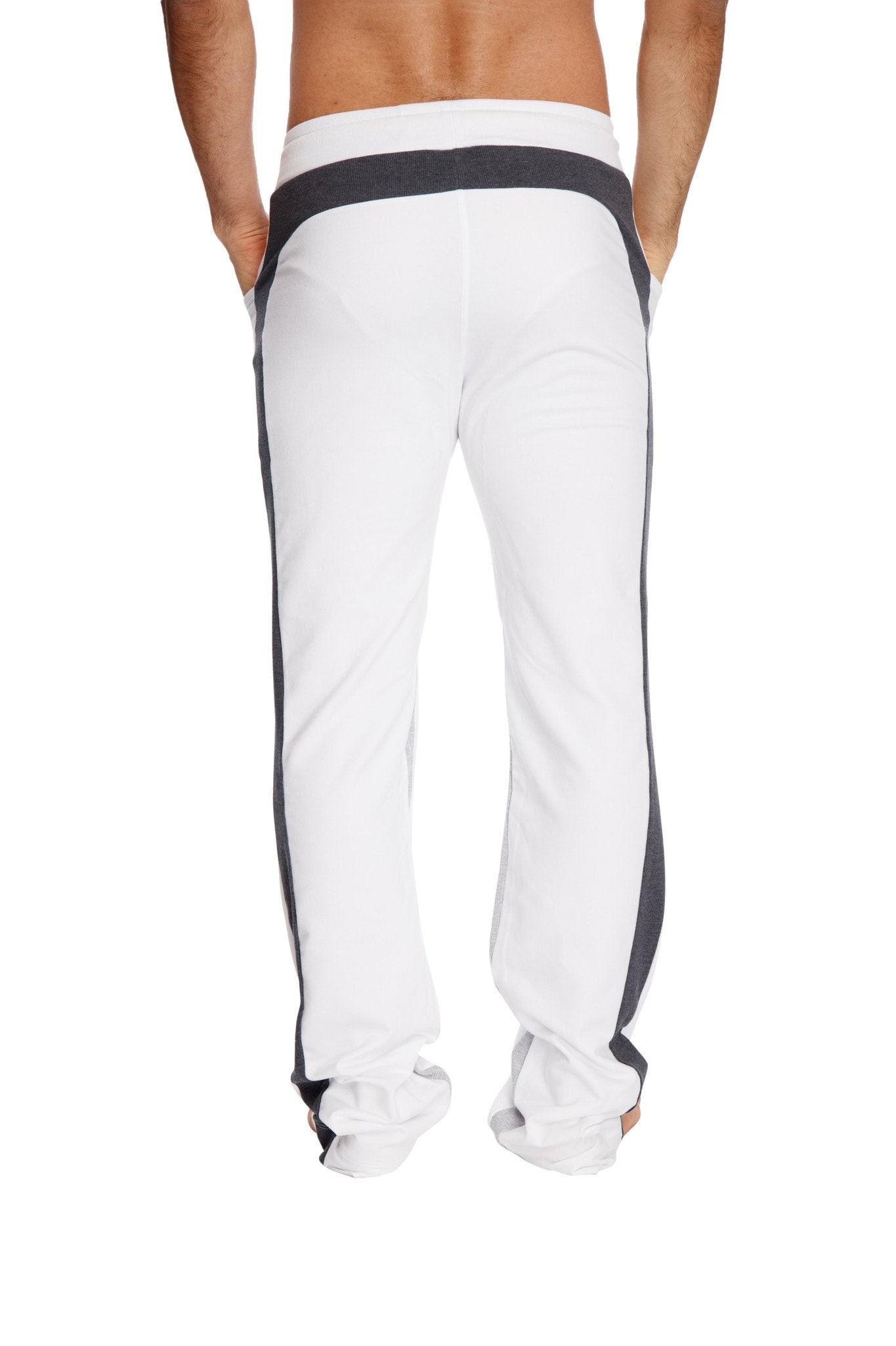 White ultra flex yoga sweatpants with black side stripes and matching waistband featuring a relaxed fit