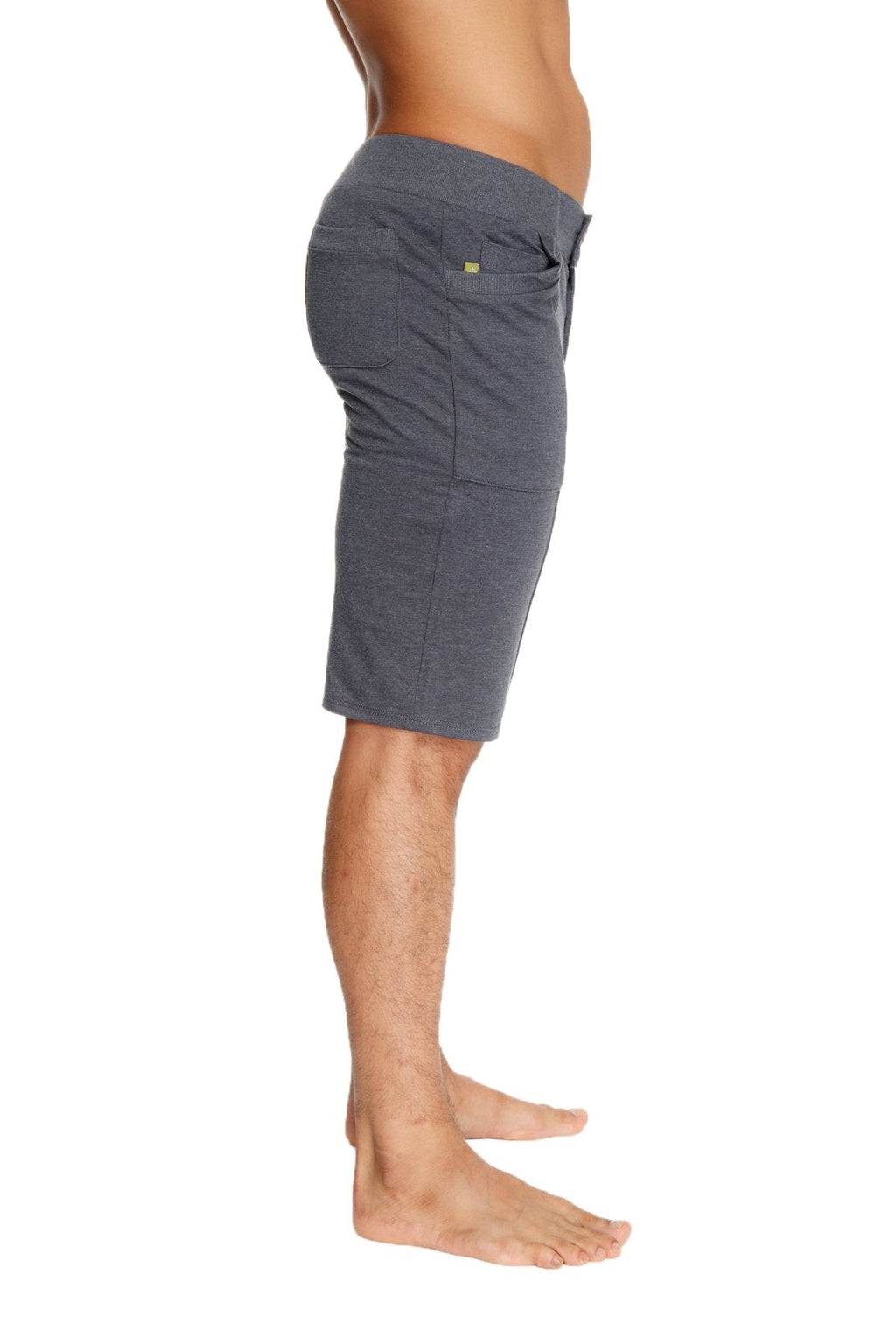 Urban tactical charcoal gray heathered shorts with drawstring waist, side pockets, and small green logo on right pocket