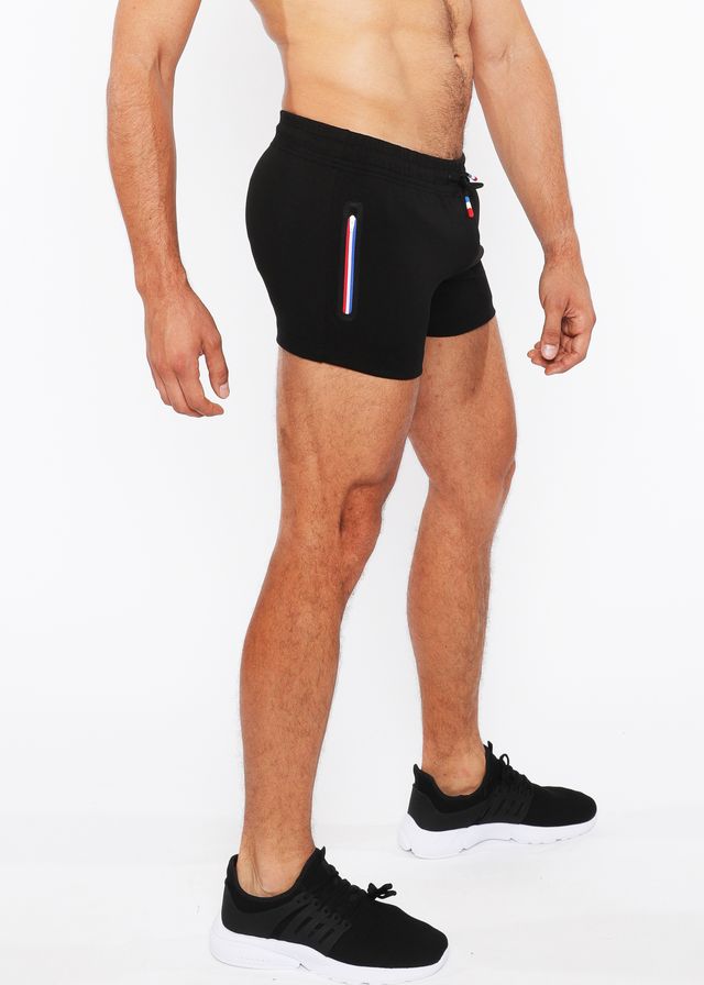 Black vault gym-tech shorts with vertical stripe detail and three color heat weld zippers for athletic use
