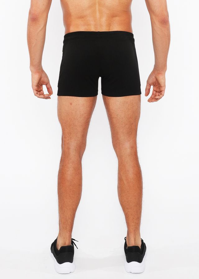 Black vault gym-tech shorts with a snug fit elastic waistband and three color heat weld zippers for athletic use