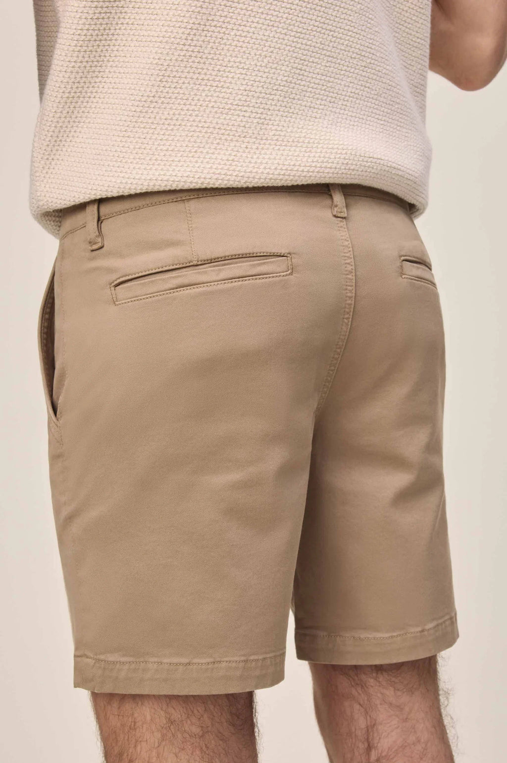 Back view of Warp + Weft Denim Act Chino Short in tan, featuring welt back pockets and belt loops.