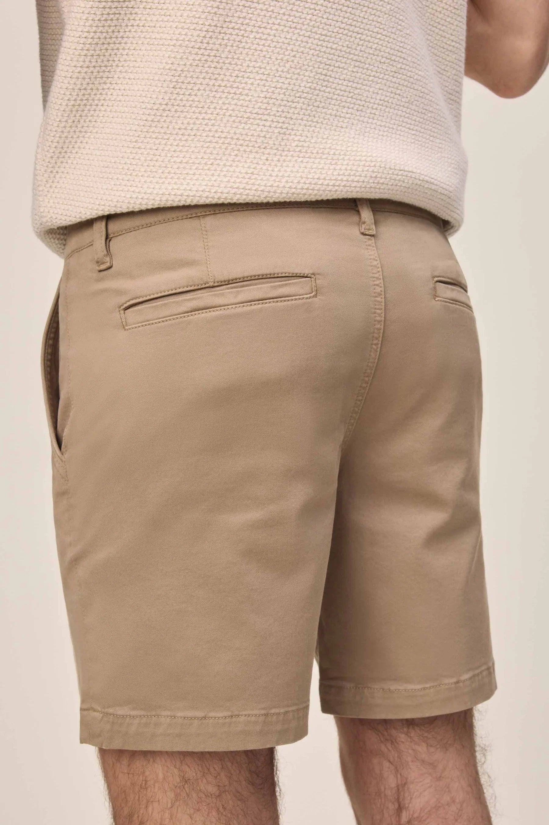 Back view of Warp + Weft Denim Act Chino Short in tan, featuring welt back pockets and belt loops.