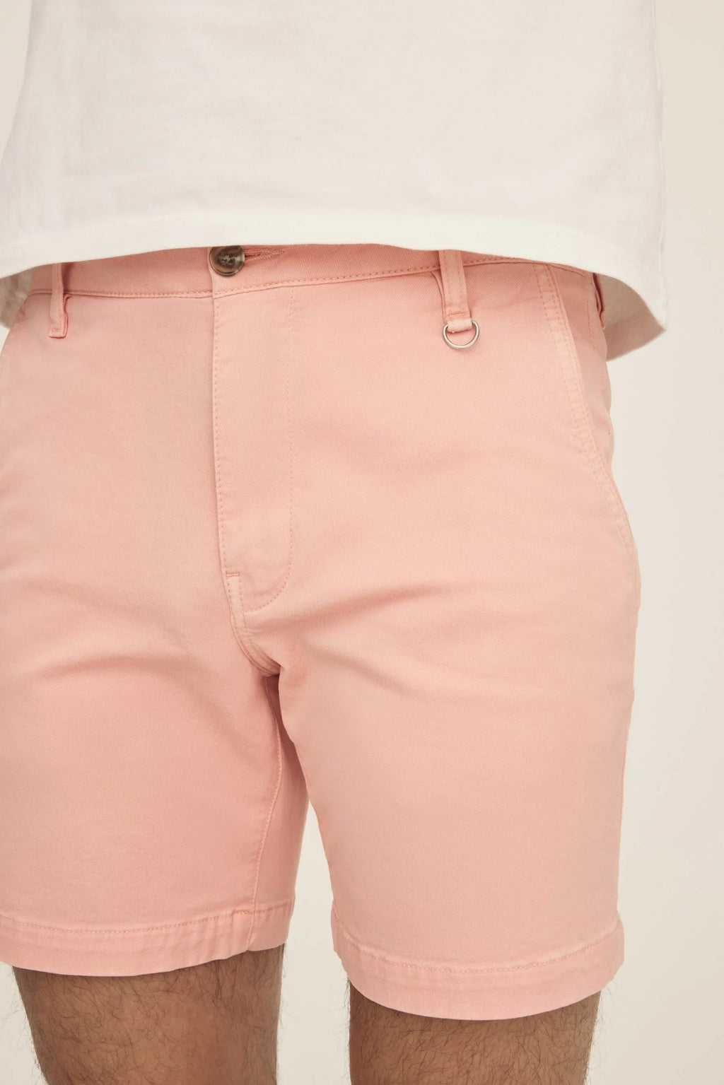 Warp + Weft Denim Act Chino Short in pink with a button closure and metal D-ring on the waistband.