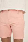 Warp + Weft Denim Act Chino Short in pink with a button closure and metal D-ring on the waistband.
